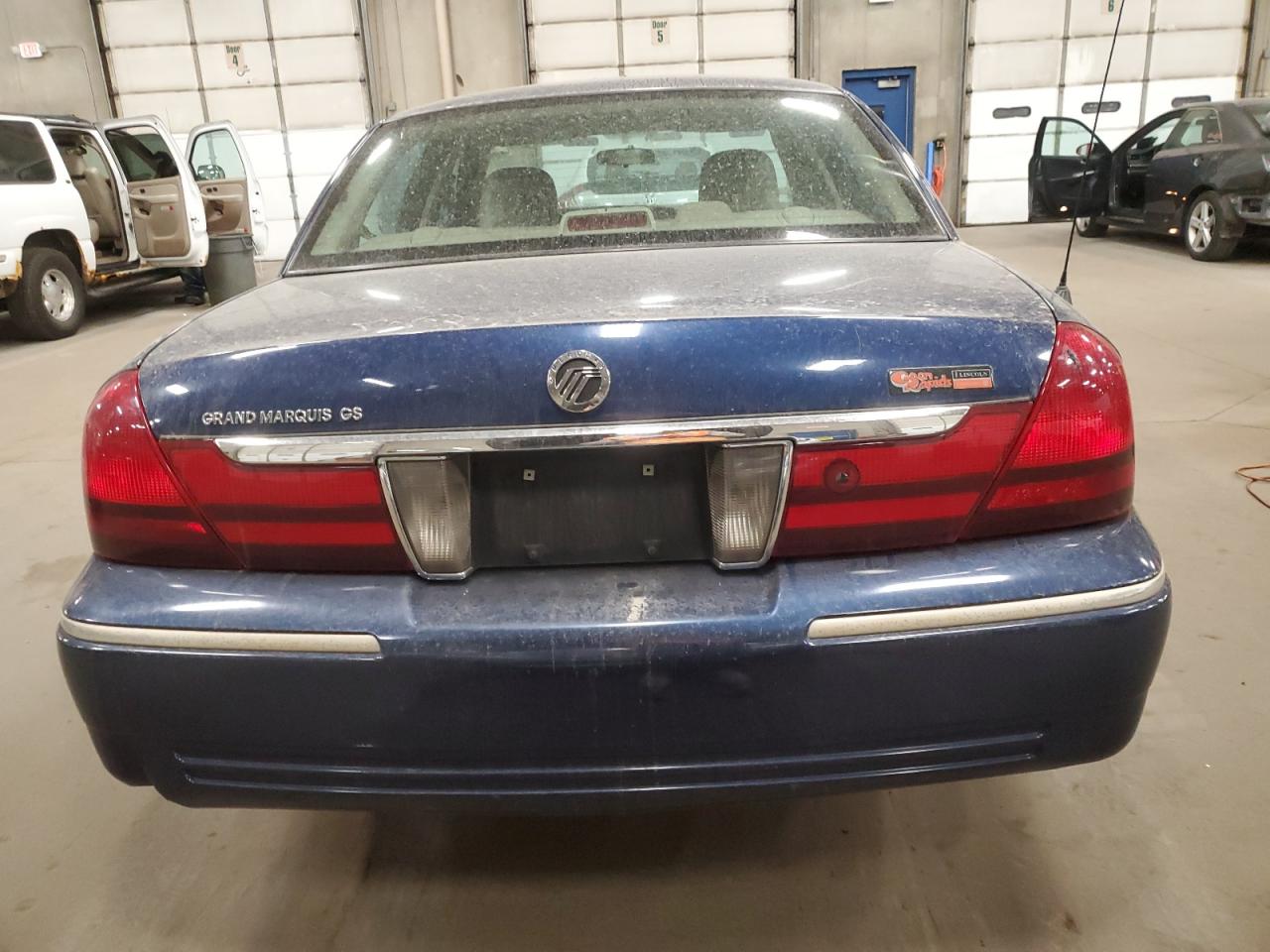 2005 Mercury Grand Marquis Gs VIN: 2MEFM74W35X672051 Lot: 75477324