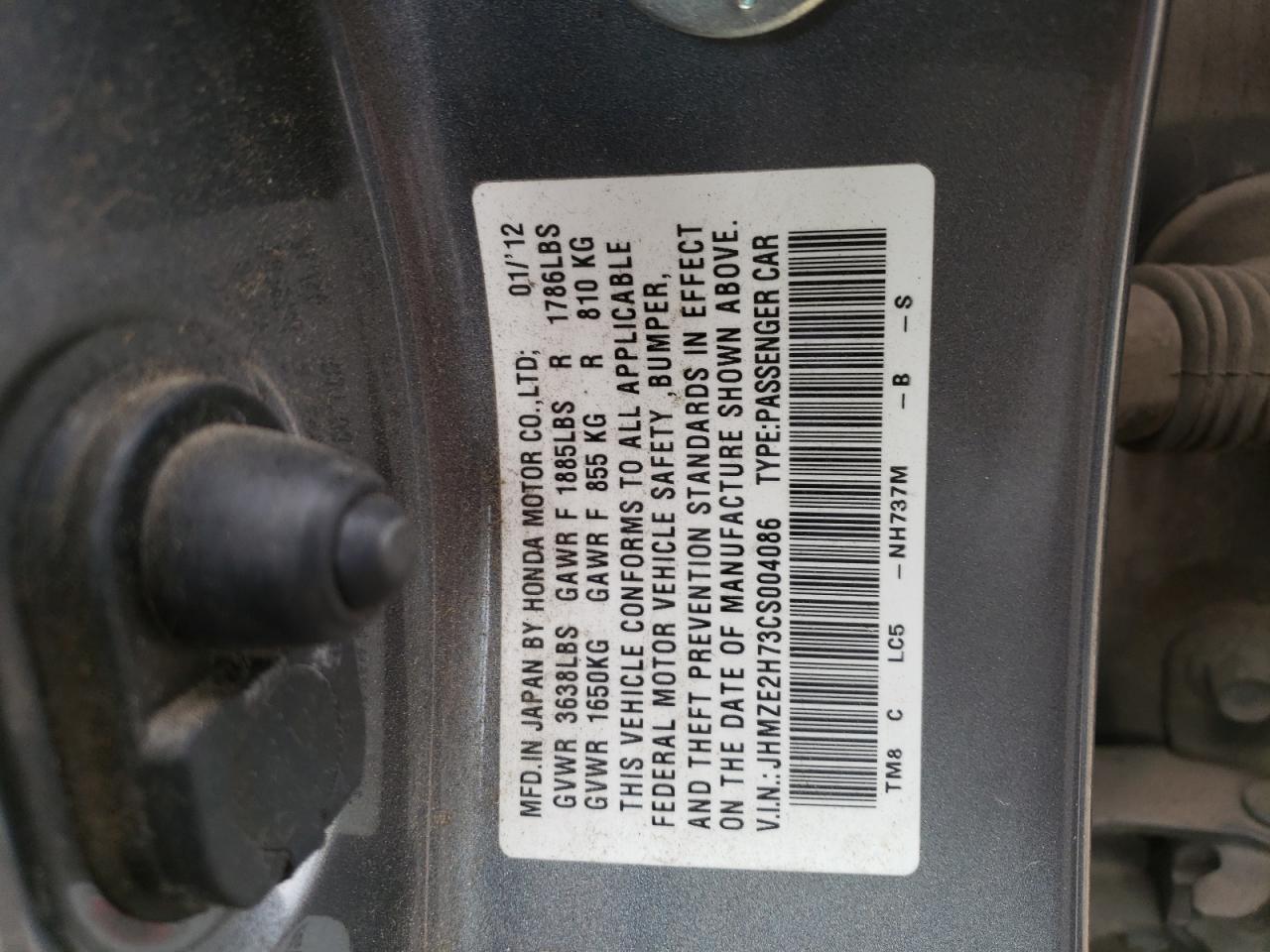 2012 Honda Insight Ex VIN: JHMZE2H73CS004086 Lot: 77043254