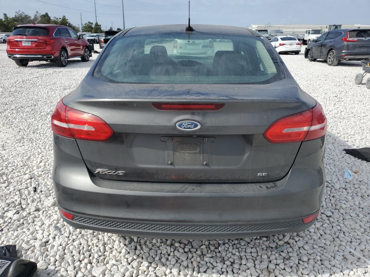 2015 Ford Focus Se VIN: 1FADP3F25FL300752 Lot: 75860944