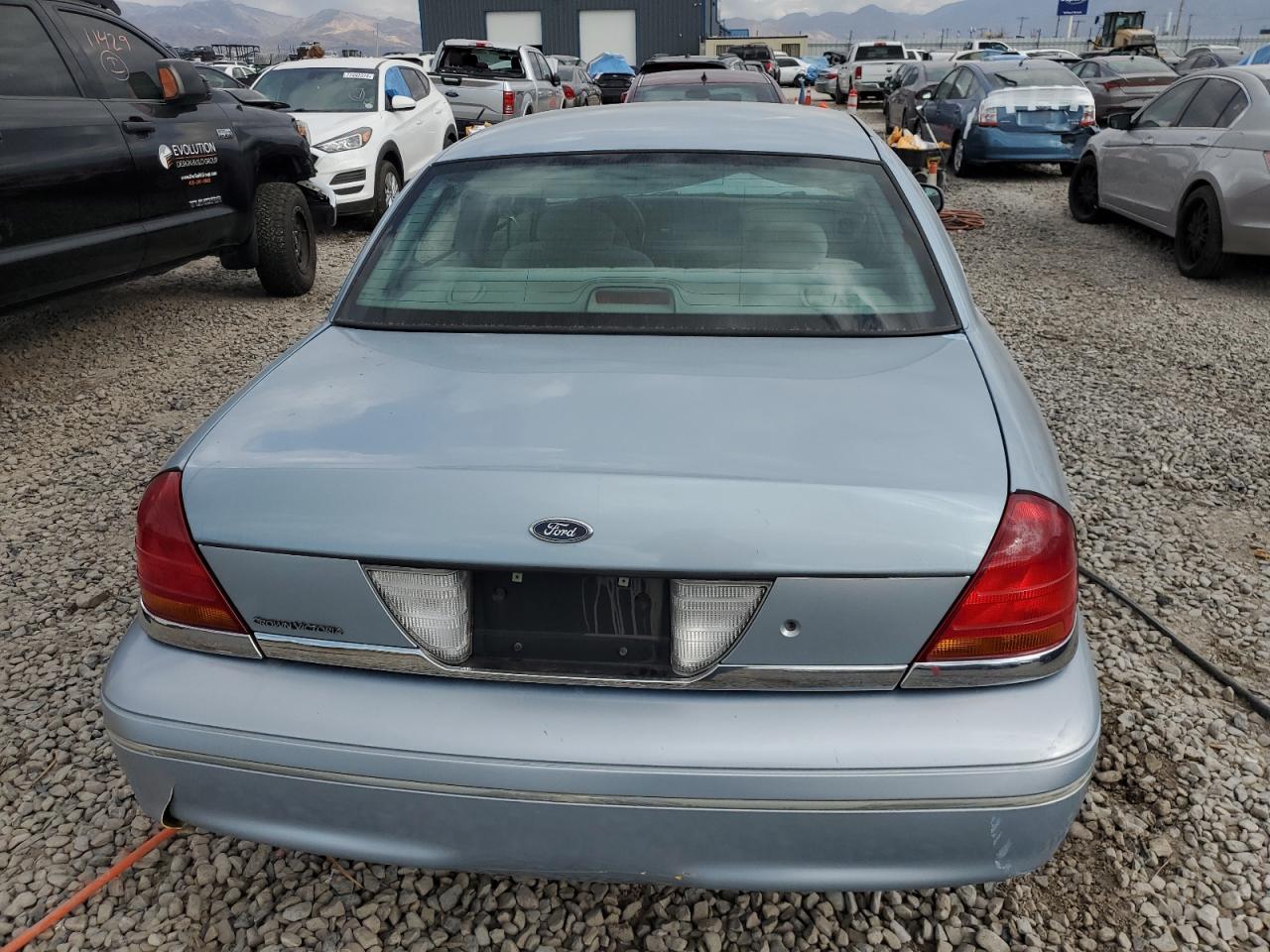 2002 Ford Crown Victoria VIN: 2FAFP73W62X129904 Lot: 76920564