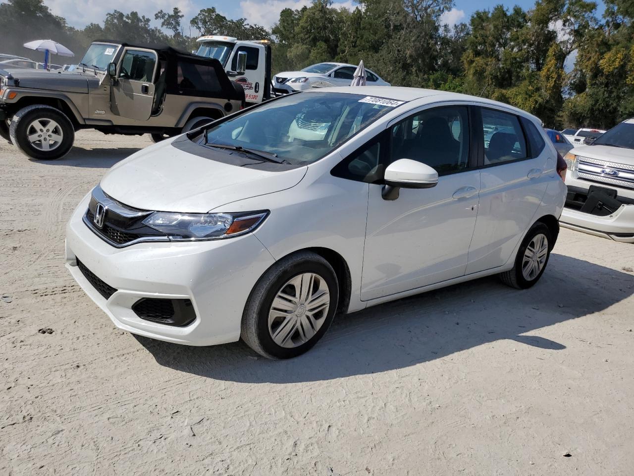 2018 Honda Fit Lx VIN: 3HGGK5H49JM703643 Lot: 77081064