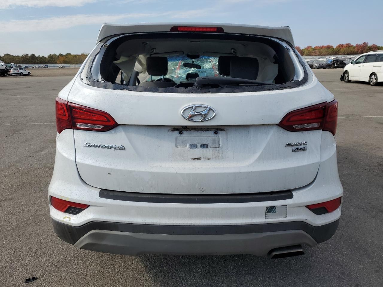 2018 Hyundai Santa Fe Sport VIN: 5XYZTDLBXJG539448 Lot: 77272184