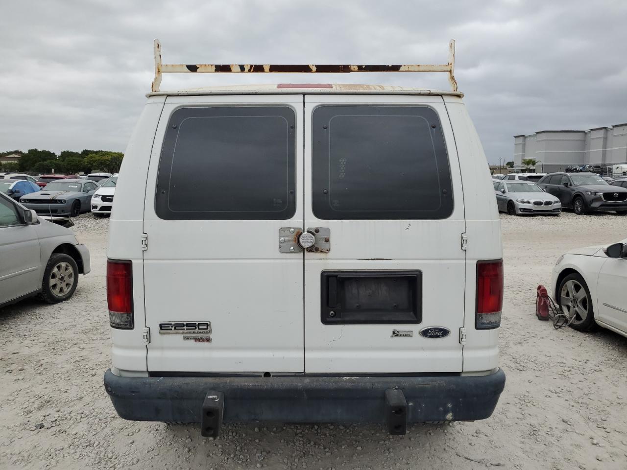 1FTNE2EW8CDA24589 2012 Ford Econoline E250 Van