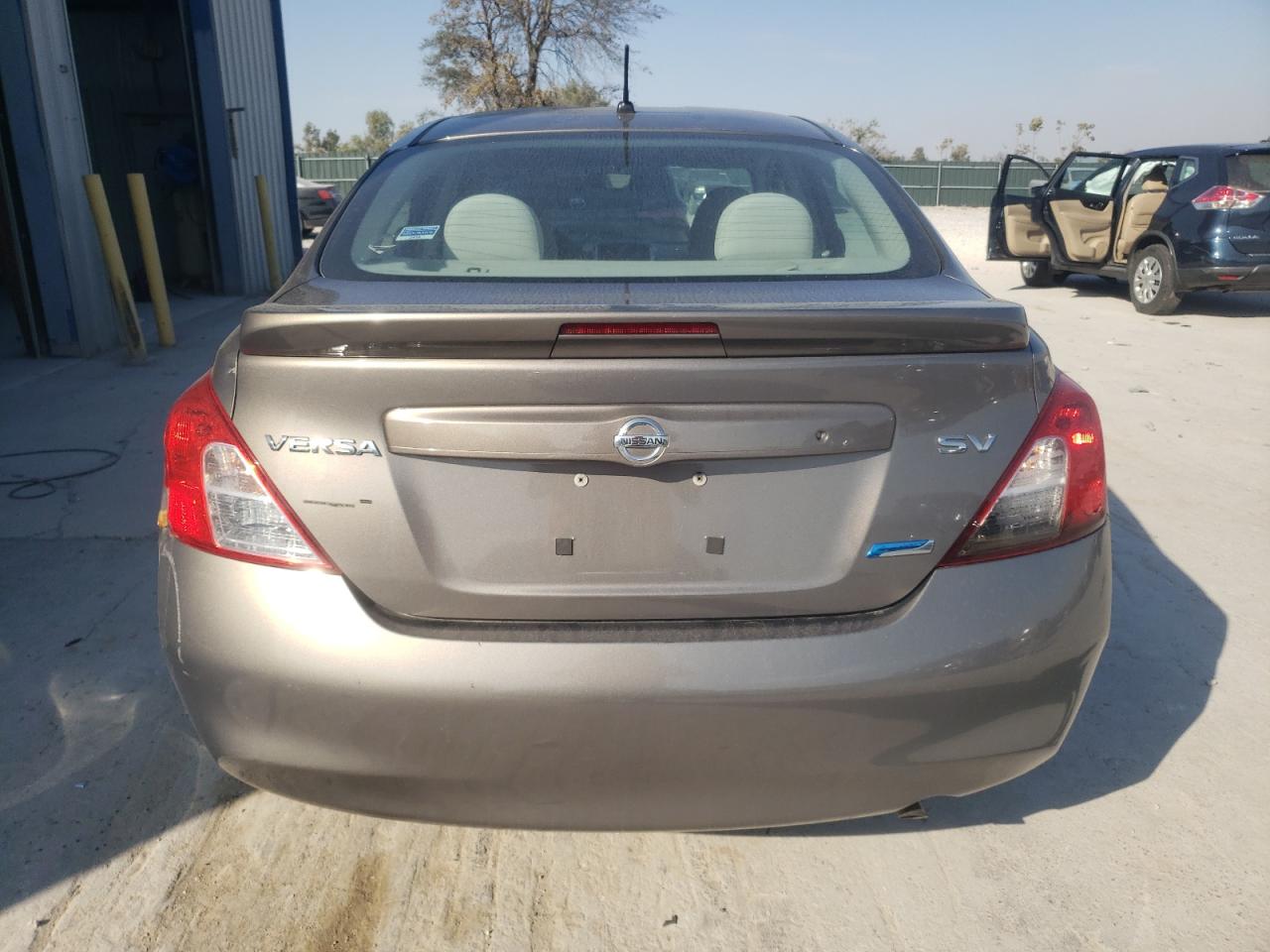 2014 Nissan Versa S VIN: 3N1CN7AP3EL808584 Lot: 76911684