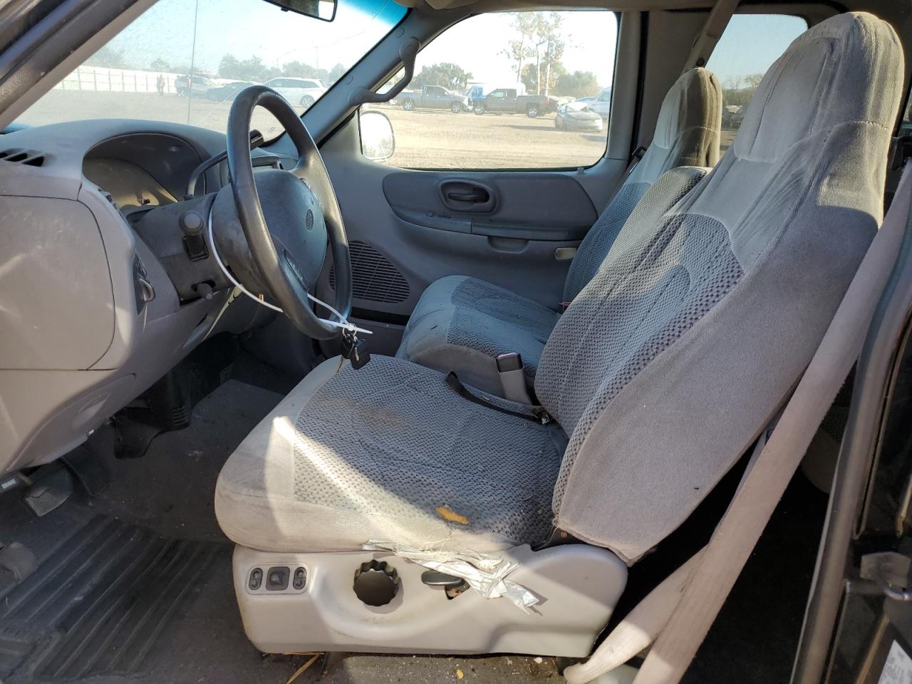 1999 Ford F150 VIN: 1FTRX18L3XKB59326 Lot: 75944074