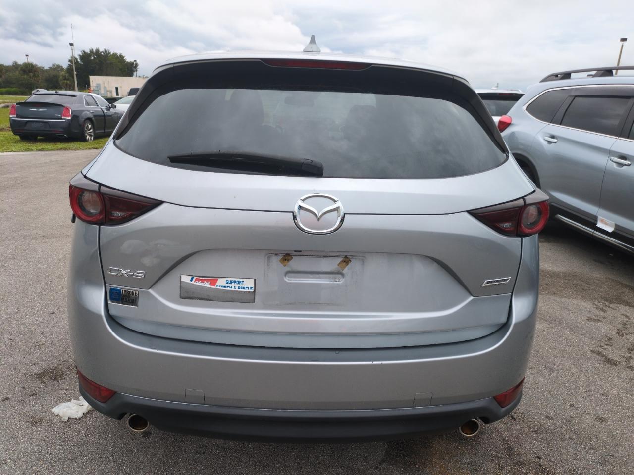 2019 Mazda Cx-5 Touring VIN: JM3KFACM1K1699557 Lot: 74680794