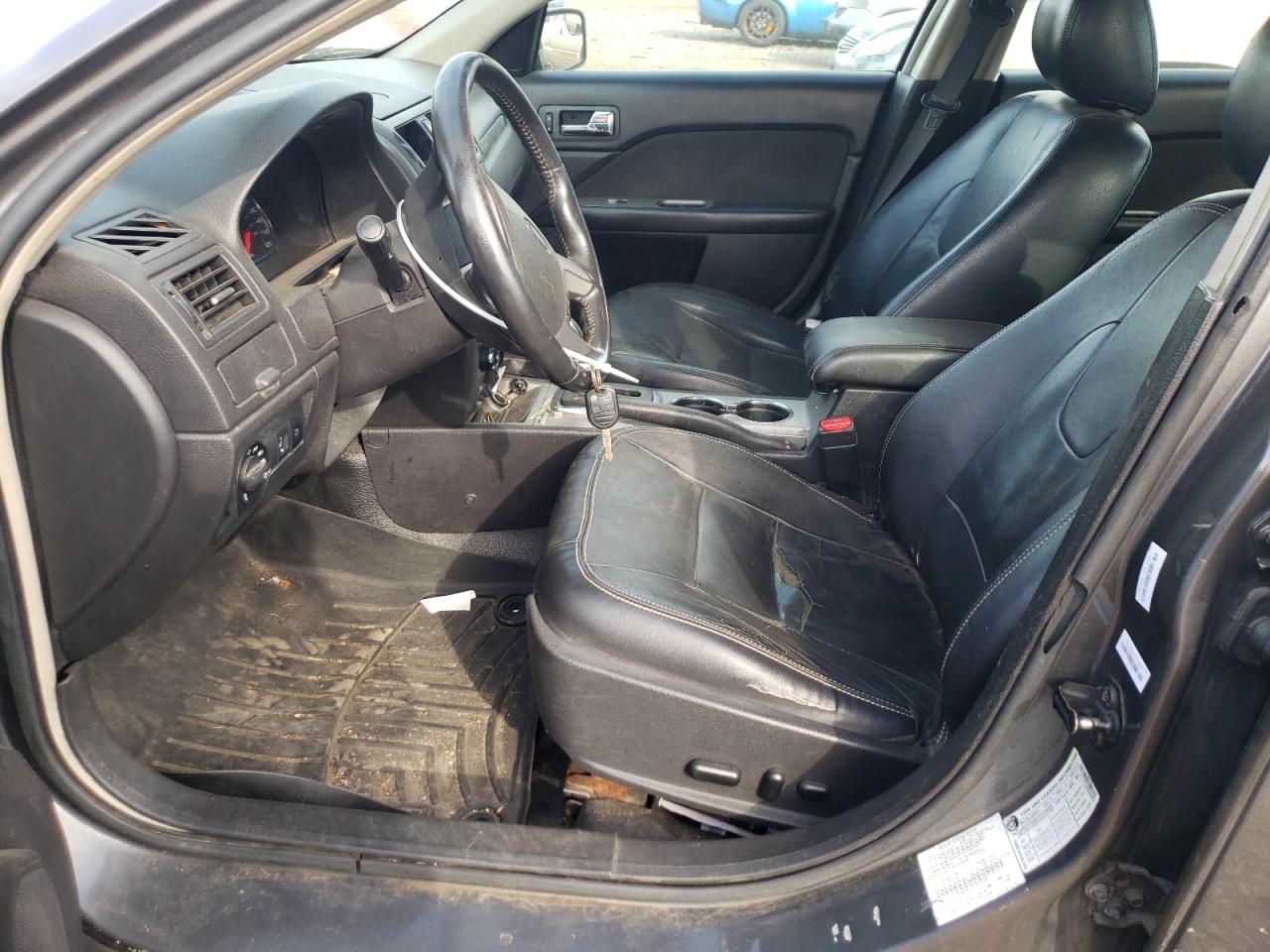 2012 Ford Fusion Hybrid VIN: 3FADP0L33CR399869 Lot: 75007624