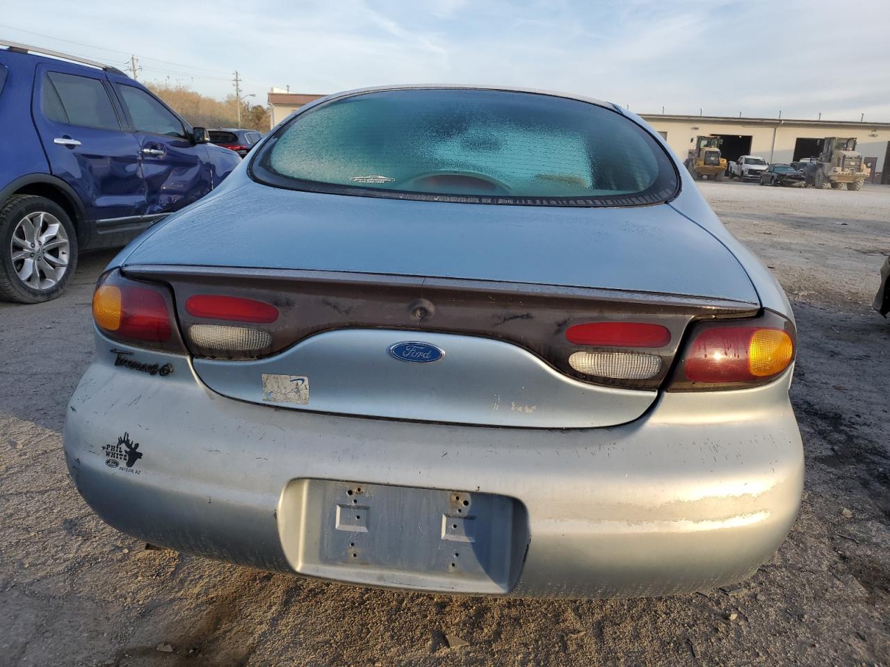 1997 Ford Taurus G VIN: 1FALP51U8VA192556 Lot: 77604464