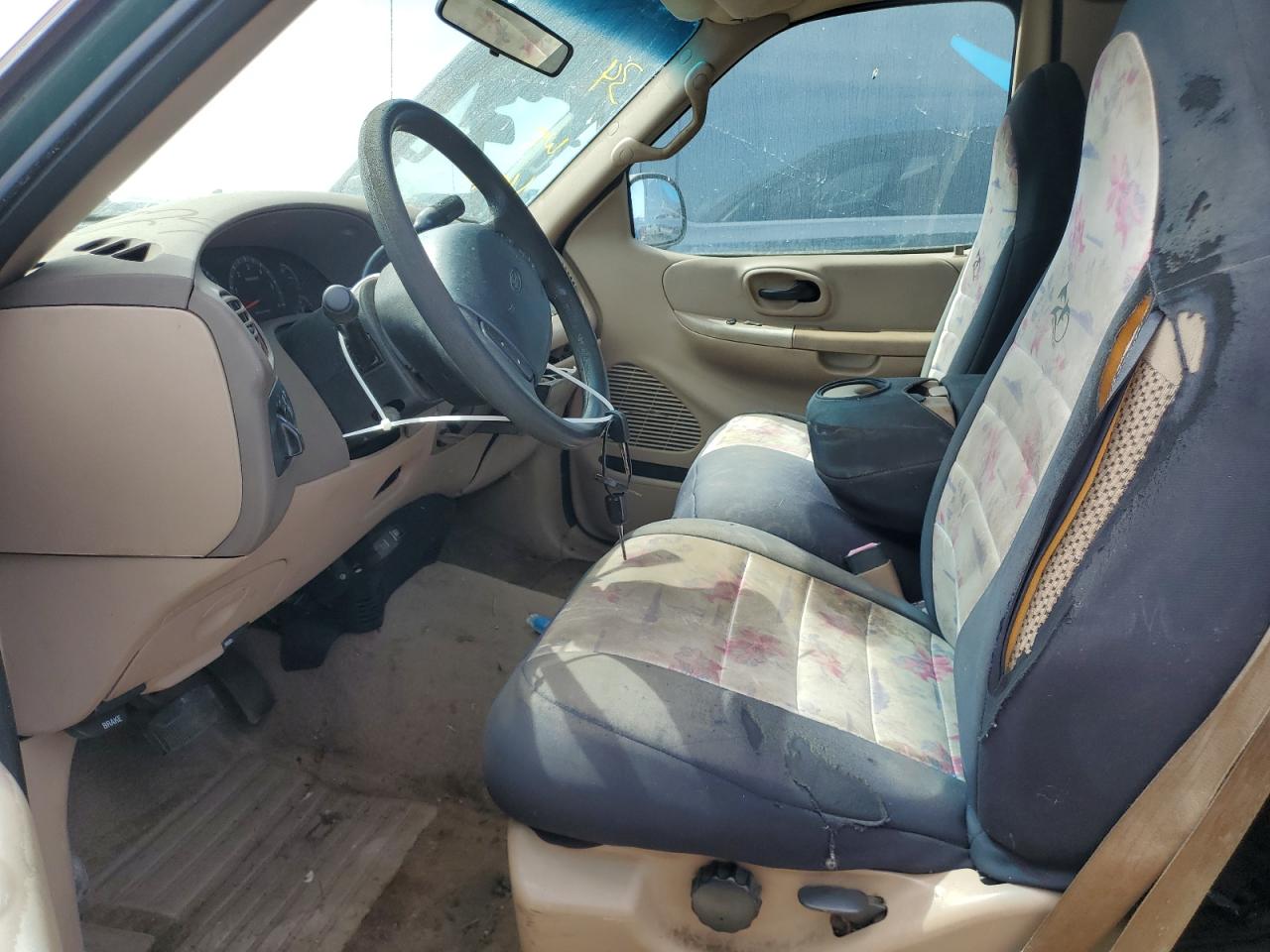 1999 Ford F150 VIN: 1FTRX18L9XNB93317 Lot: 74924964