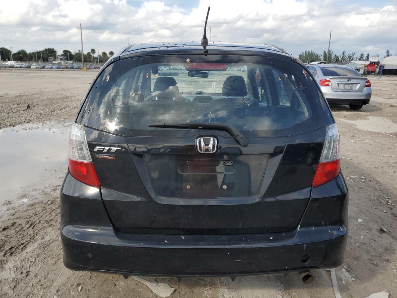 2013 Honda Fit VIN: JHMGE8H32DC080725 Lot: 77049094