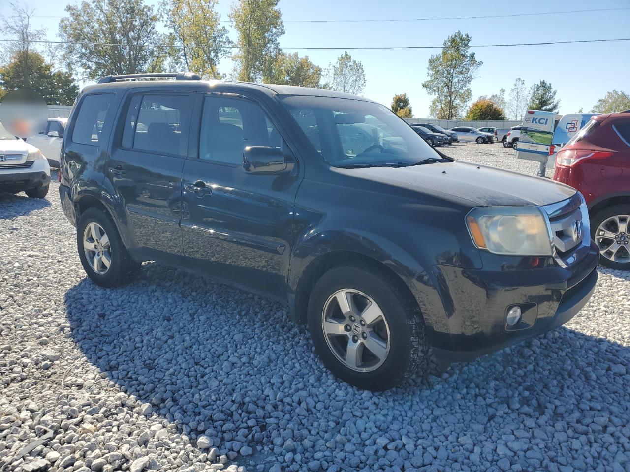 2011 Honda Pilot Exl VIN: 5FNYF4H66BB021537 Lot: 74243154