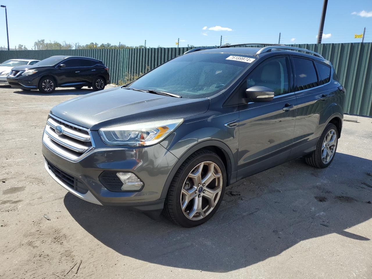 2017 Ford Escape Titanium VIN: 1FMCU0JD5HUB12862 Lot: 76189974