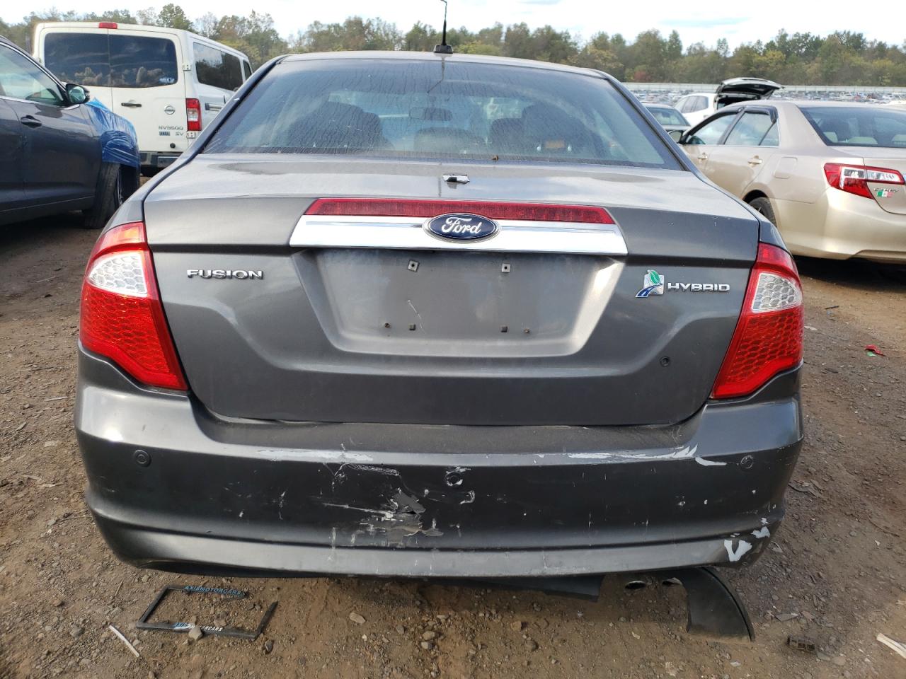 2012 Ford Fusion Hybrid VIN: 3FADP0L33CR399869 Lot: 75007624