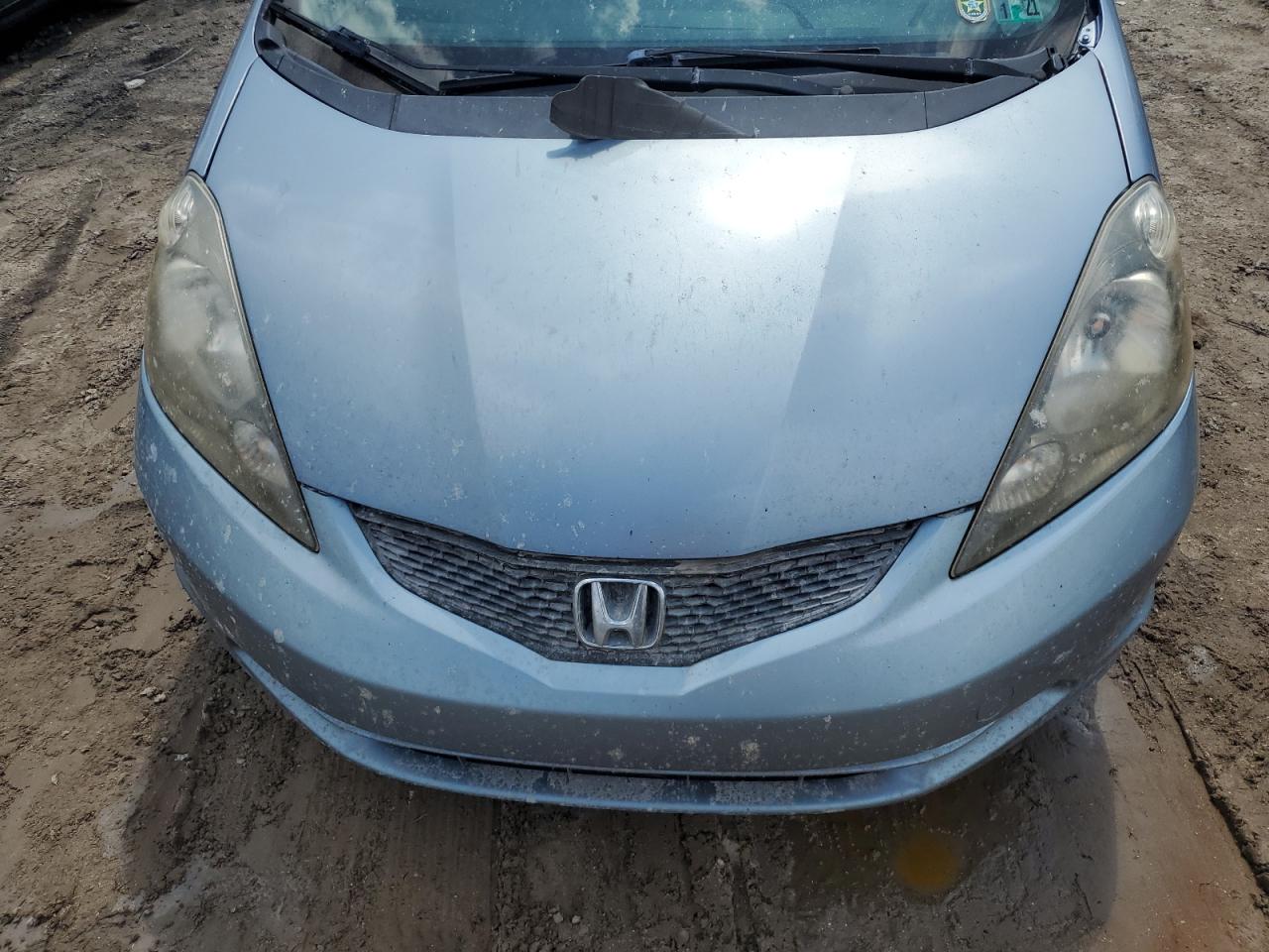 2011 Honda Fit VIN: JHMGE8H38BC013379 Lot: 73808534