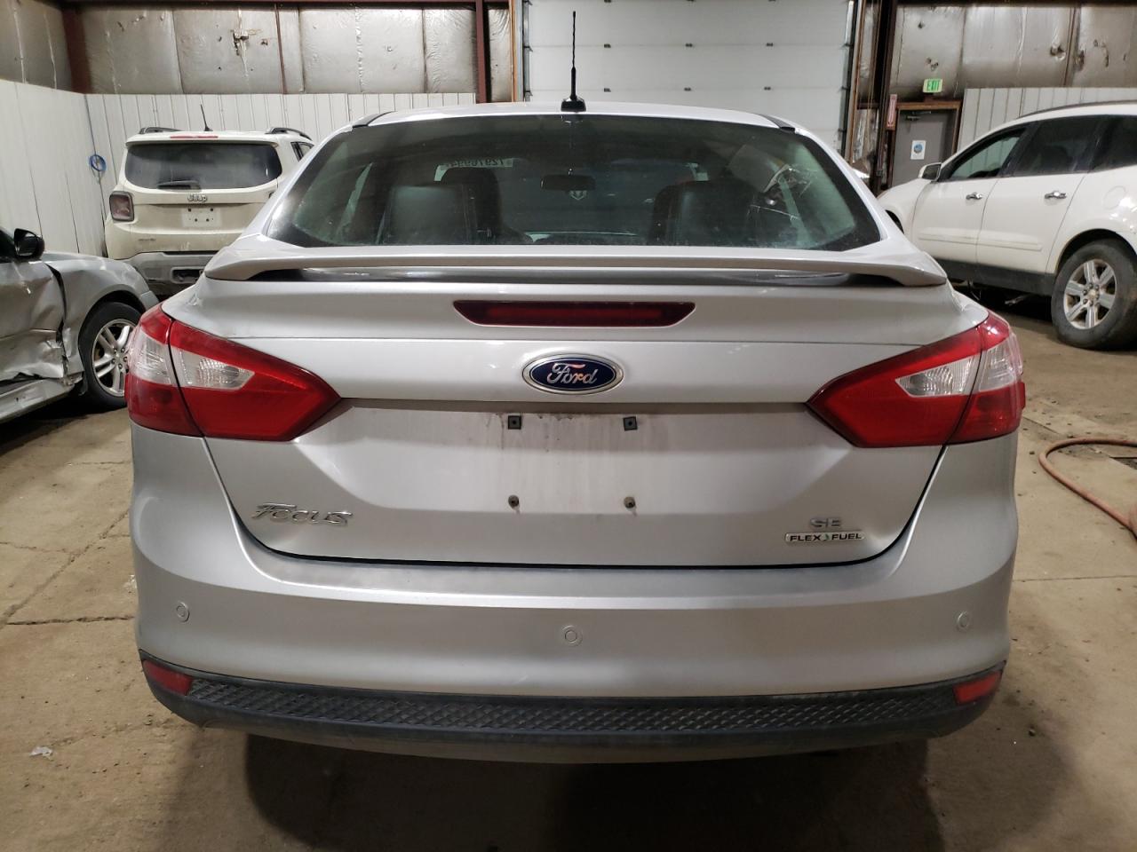 2014 Ford Focus Se VIN: 1FADP3F25EL157171 Lot: 72976994