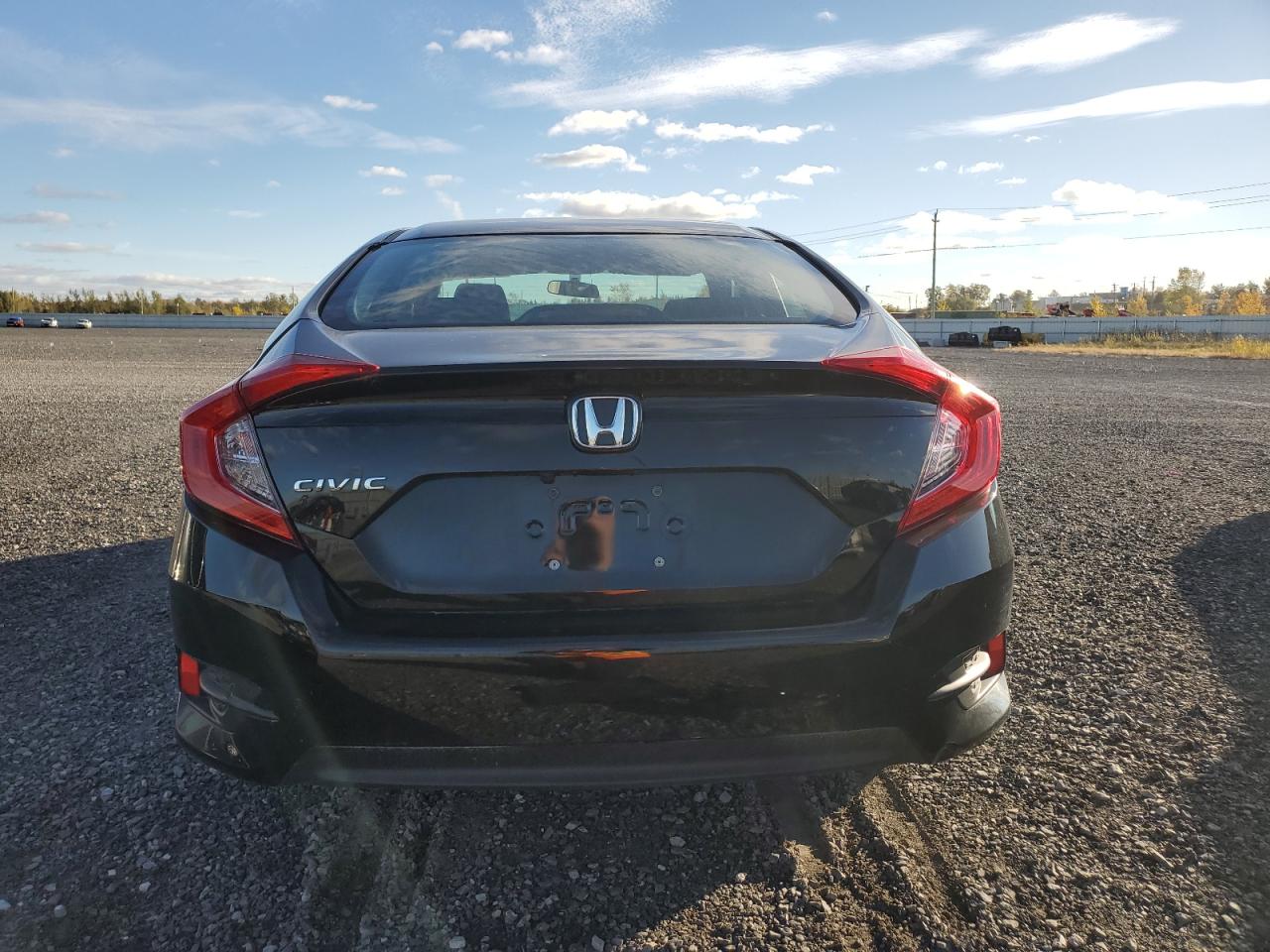 2018 Honda Civic Lx VIN: 2HGFC2F50JH013989 Lot: 76398904