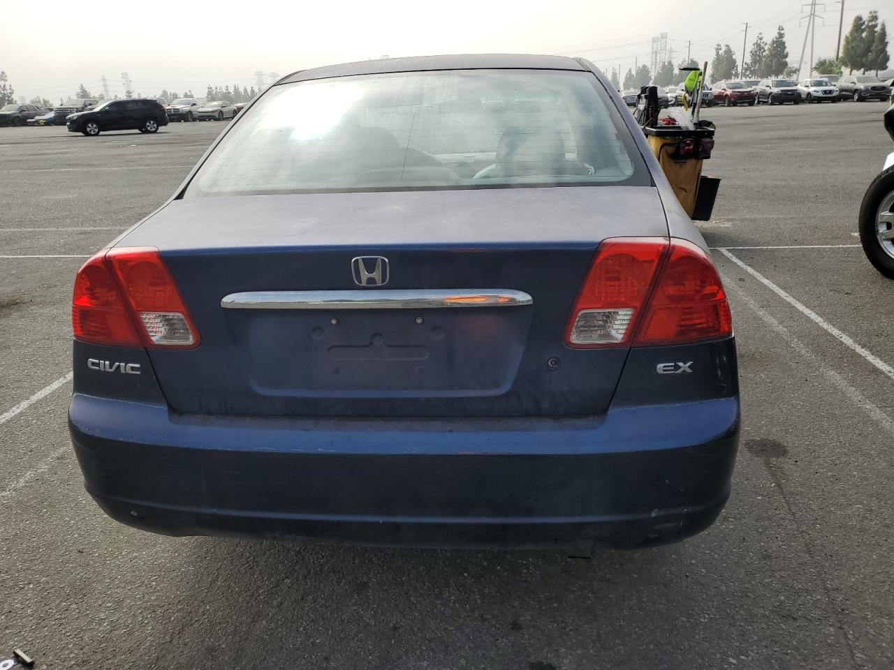 2003 Honda Civic Ex VIN: 2HGES26733H594570 Lot: 75929294