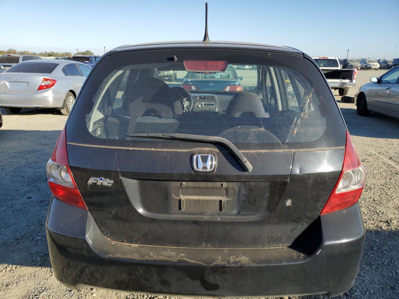 2007 Honda Fit VIN: JHMGD38477S011604 Lot: 77122814