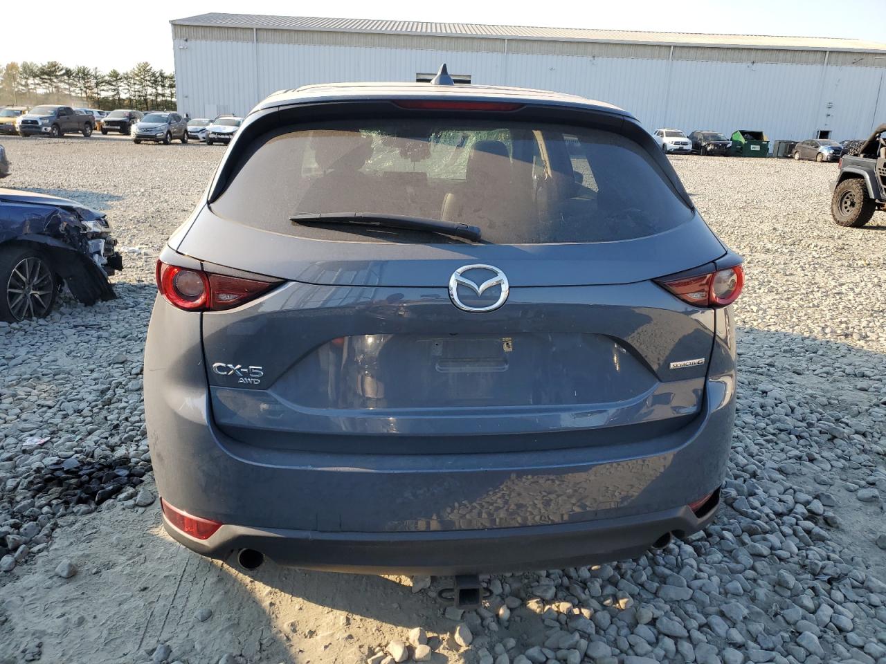 2021 Mazda Cx-5 Touring VIN: JM3KFBCM5M0346284 Lot: 75490574