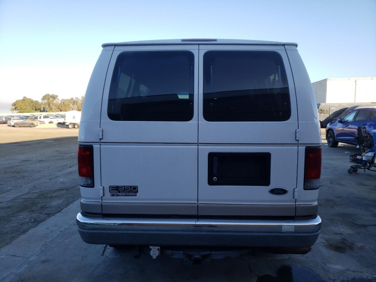 2002 Ford Econoline E350 Super Duty Wagon VIN: 1FMNE31F62HA62790 Lot: 75546384