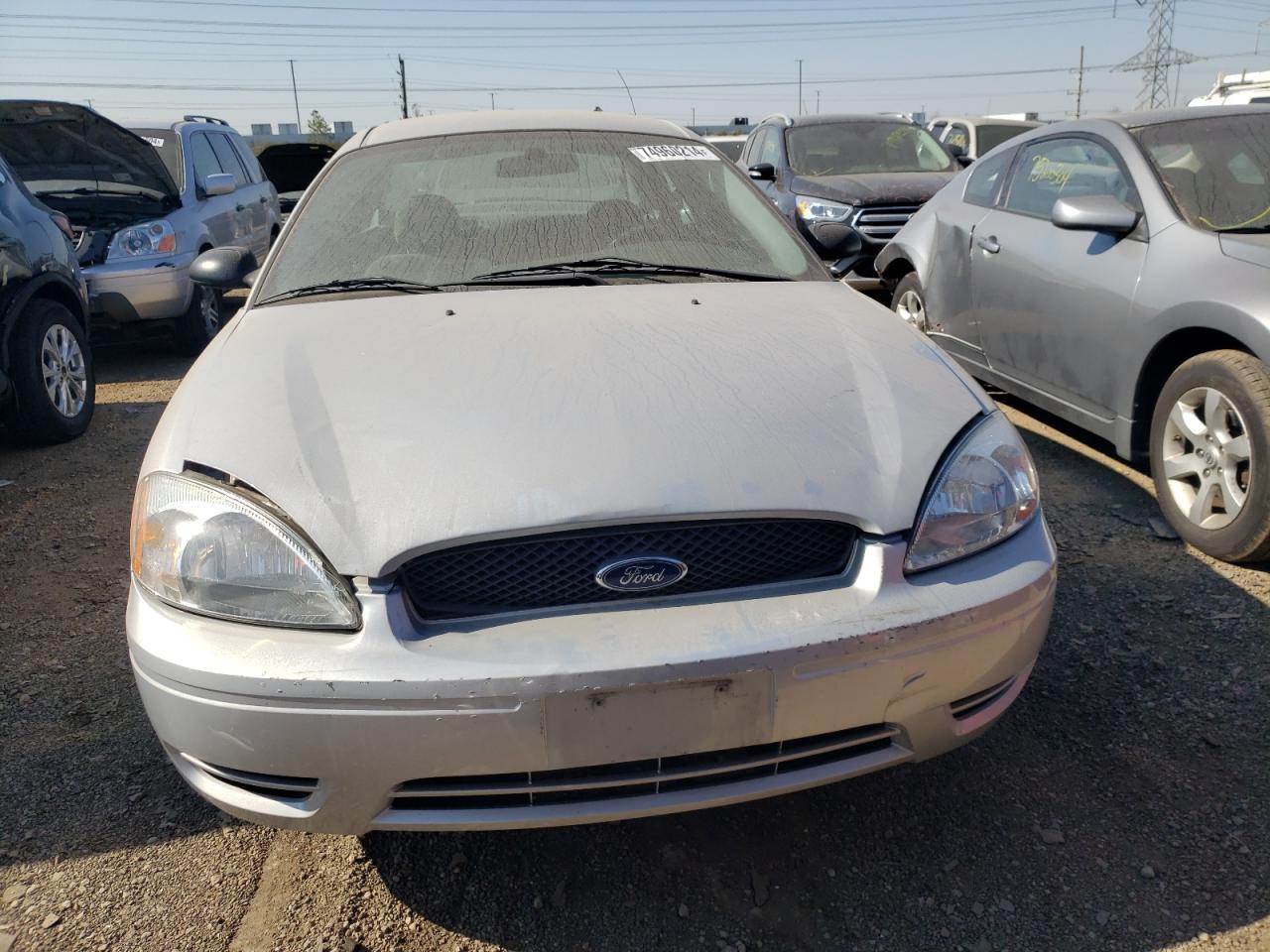 2007 Ford Taurus Se VIN: 1FAFP53U77A121975 Lot: 74960214