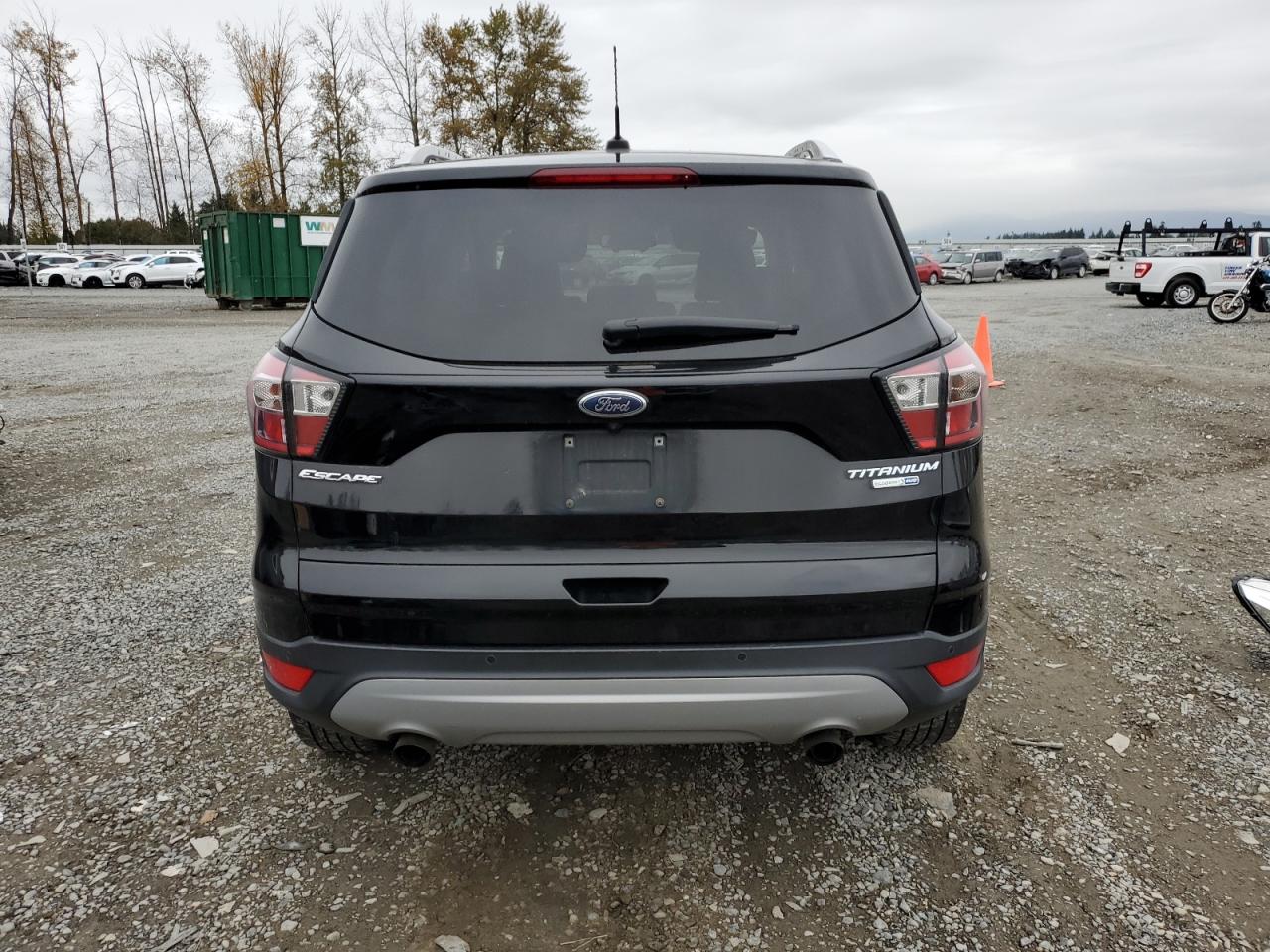 2017 Ford Escape Titanium VIN: 1FMCU9J96HUE24365 Lot: 76134554