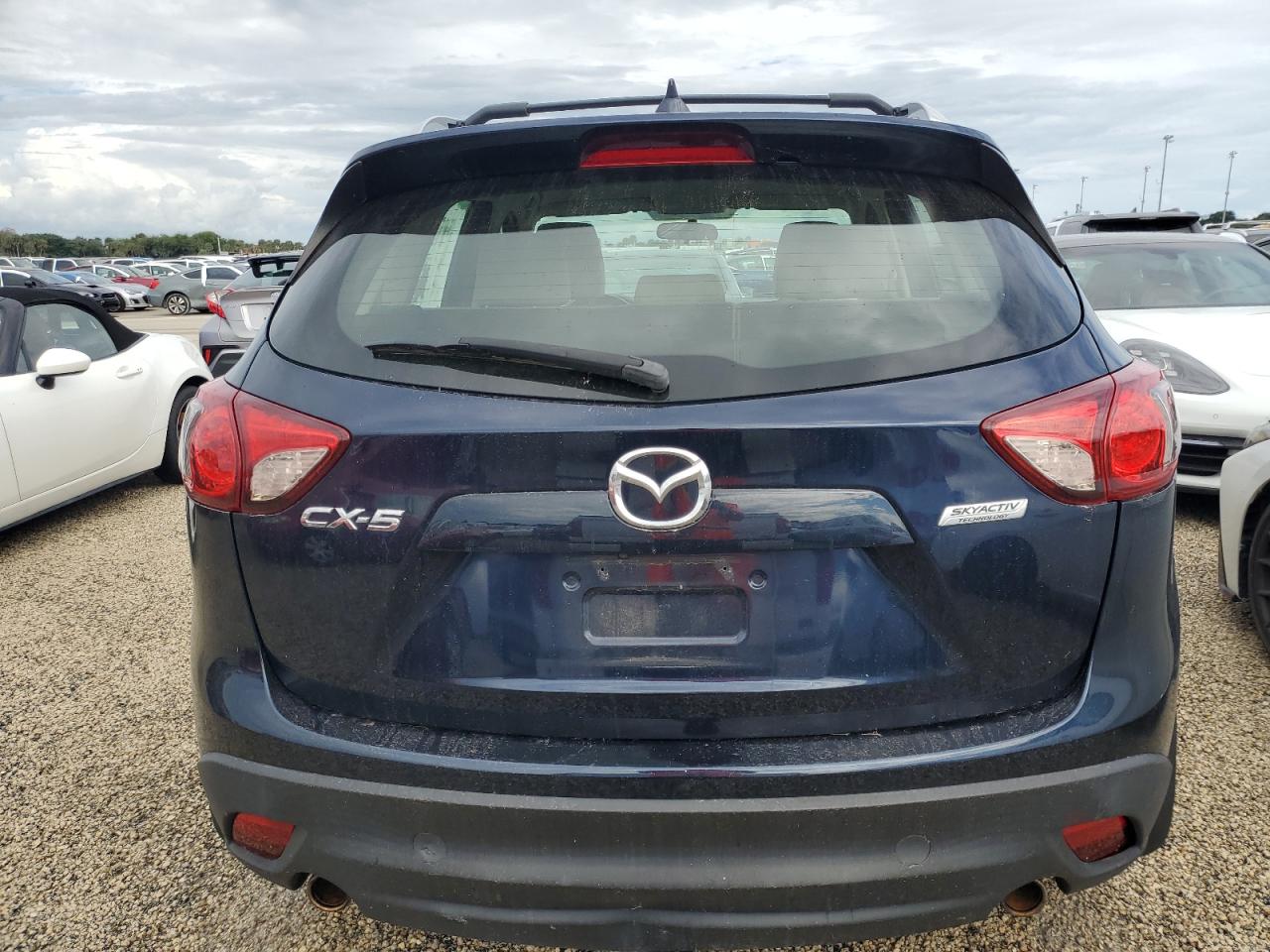 2016 Mazda Cx-5 Sport VIN: JM3KE2BY9G0897698 Lot: 74458234