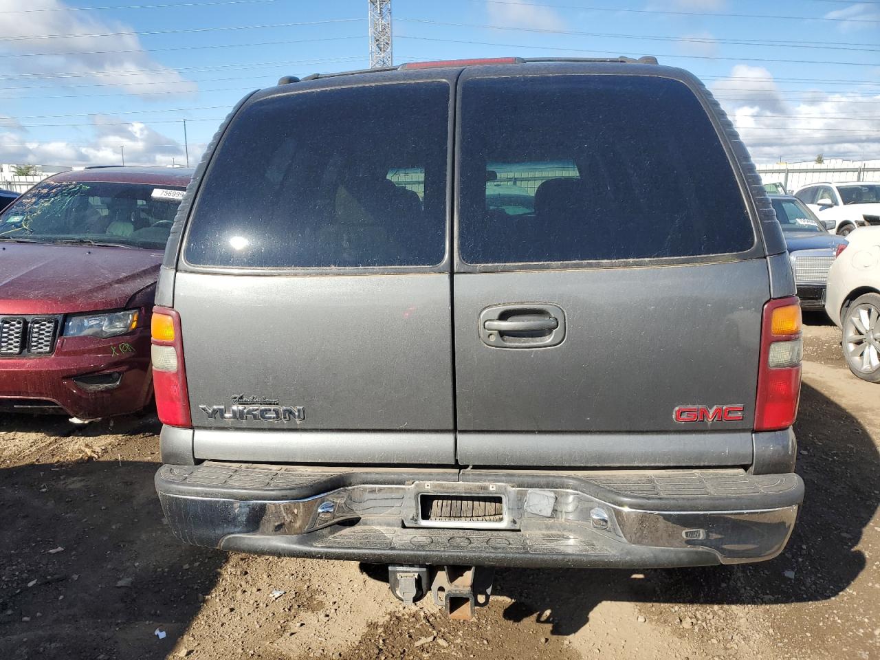 2000 GMC Yukon VIN: 1GKEC13T5YJ108942 Lot: 75210044