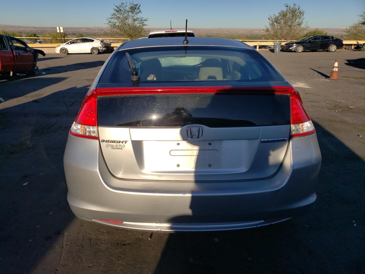 2010 Honda Insight Ex VIN: JHMZE2H73AS015649 Lot: 77575224