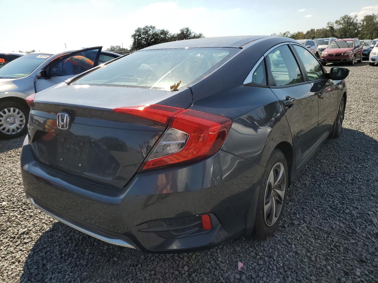 2019 Honda Civic Lx VIN: 19XFC2F69KE033890 Lot: 76479834