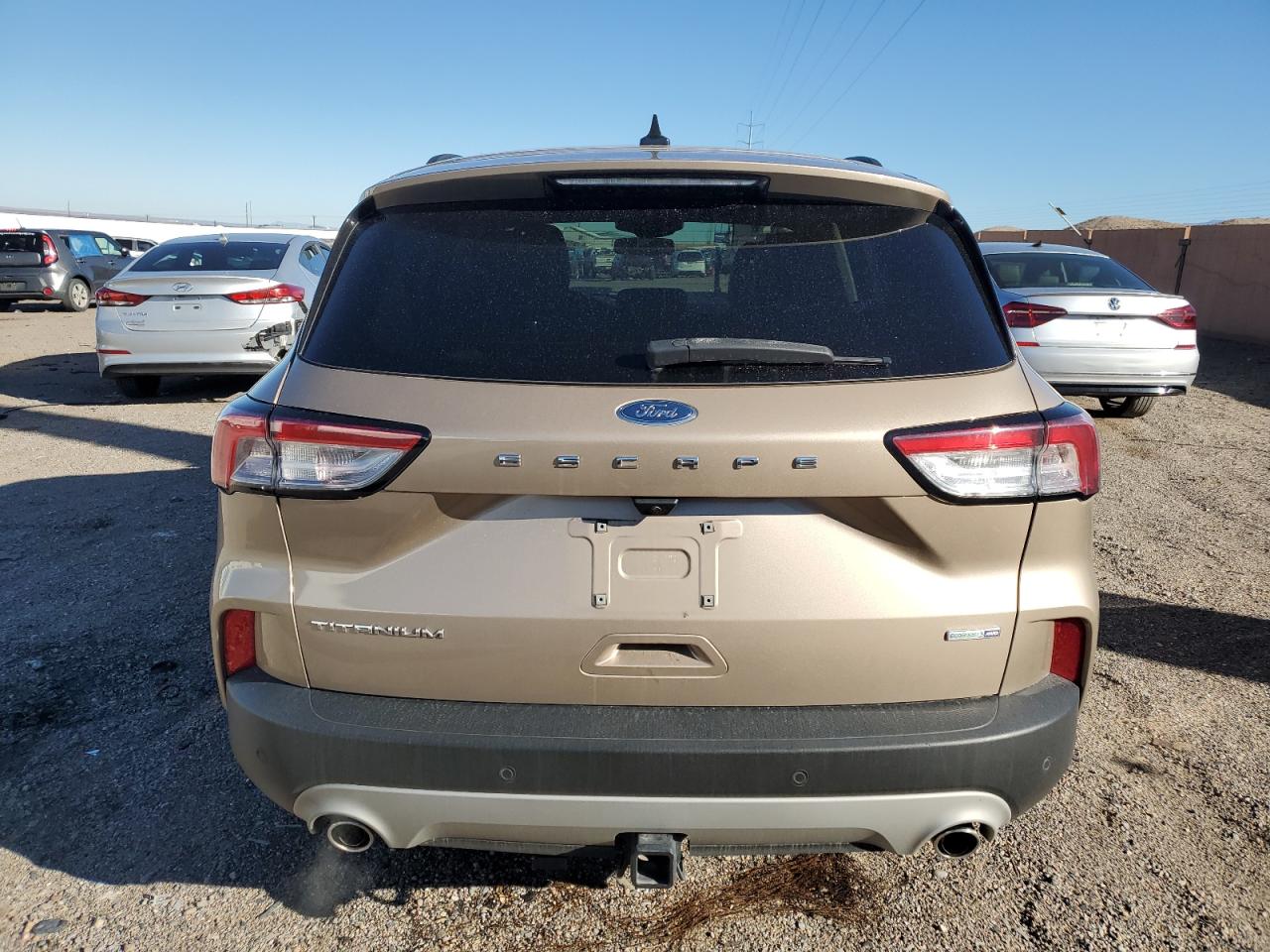 2020 Ford Escape Titanium VIN: 1FMCU9J92LUA56159 Lot: 77019584