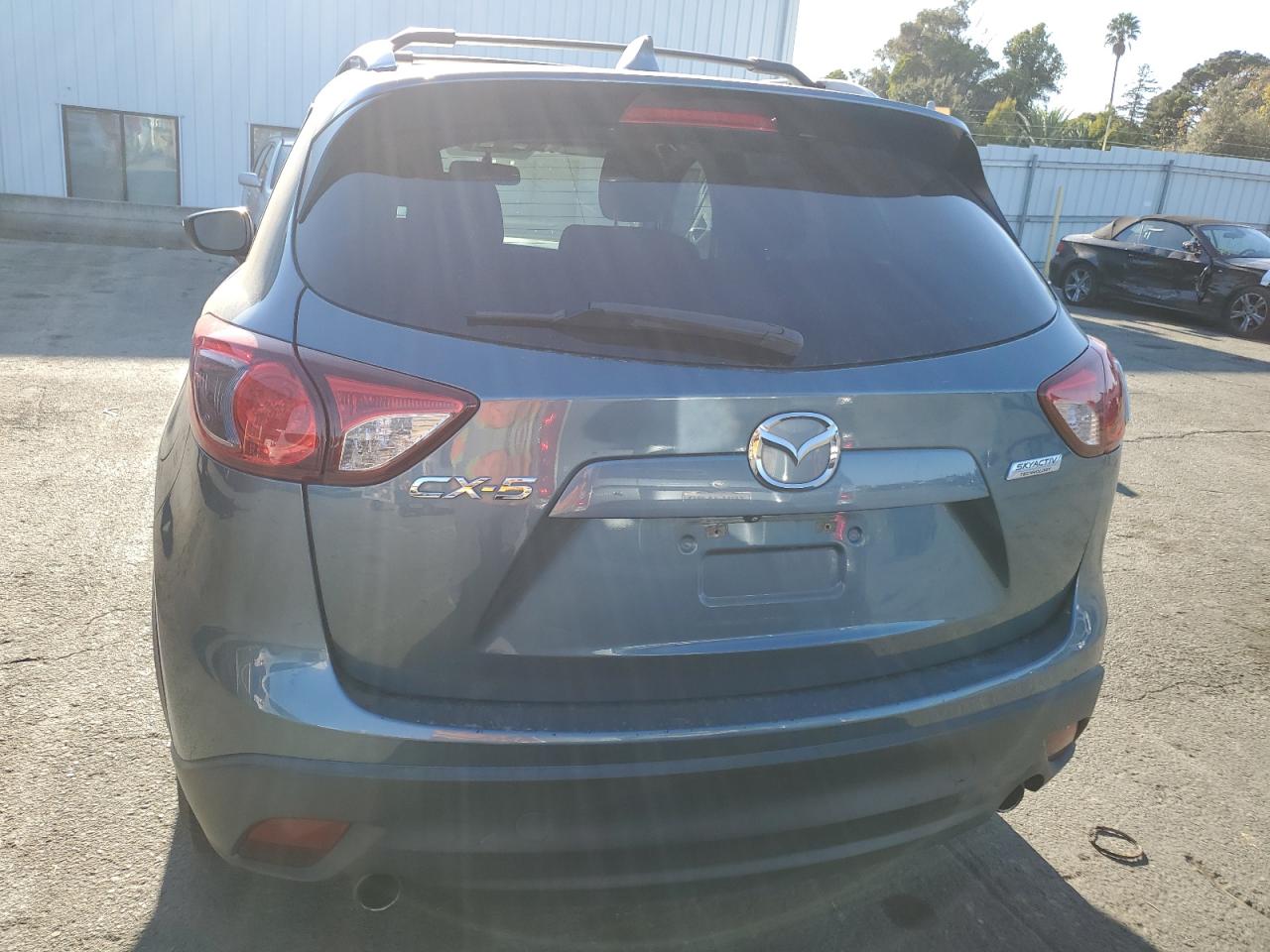 2015 Mazda Cx-5 Touring VIN: JM3KE2CY3F0489162 Lot: 77417884