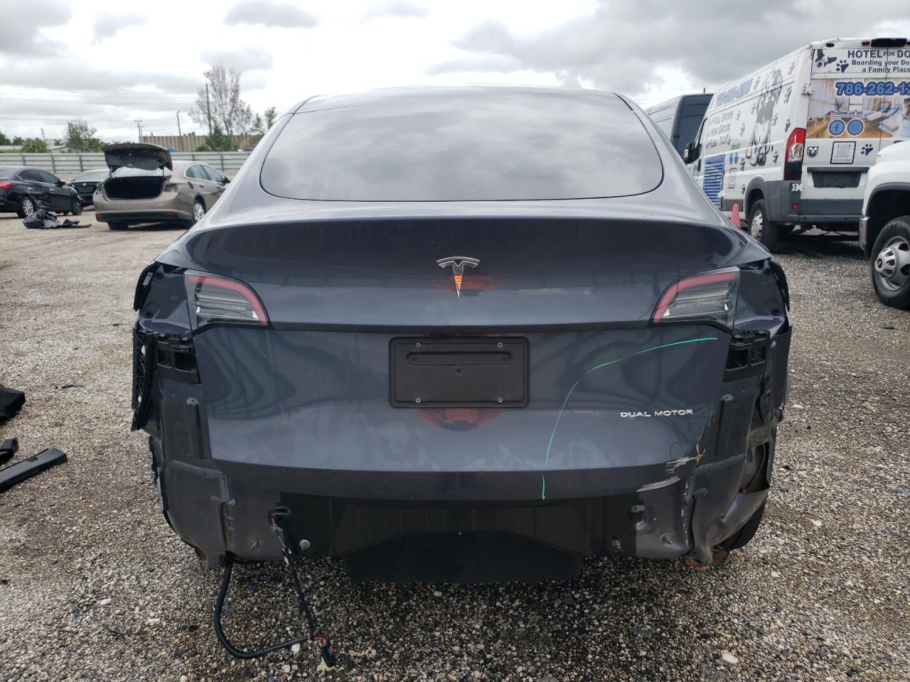 2023 Tesla Model Y VIN: 7SAYGDEE4PF870018 Lot: 74238104