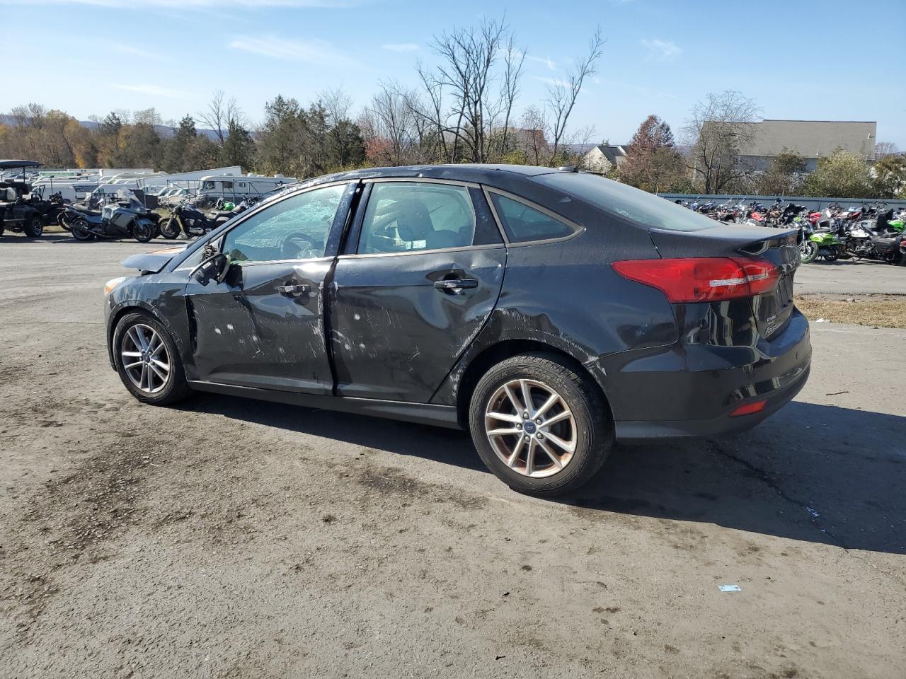 2015 Ford Focus Se VIN: 1FADP3F20FL310797 Lot: 78385584