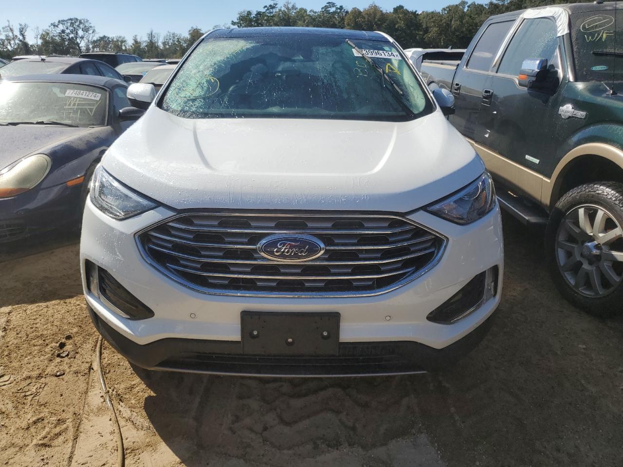 2022 Ford Edge Titanium VIN: 2FMPK4K94NBA71909 Lot: 73996134