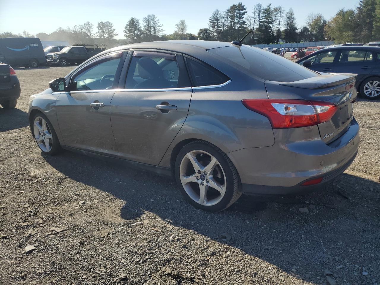 2014 Ford Focus Titanium VIN: 1FADP3J20EL357060 Lot: 76025984