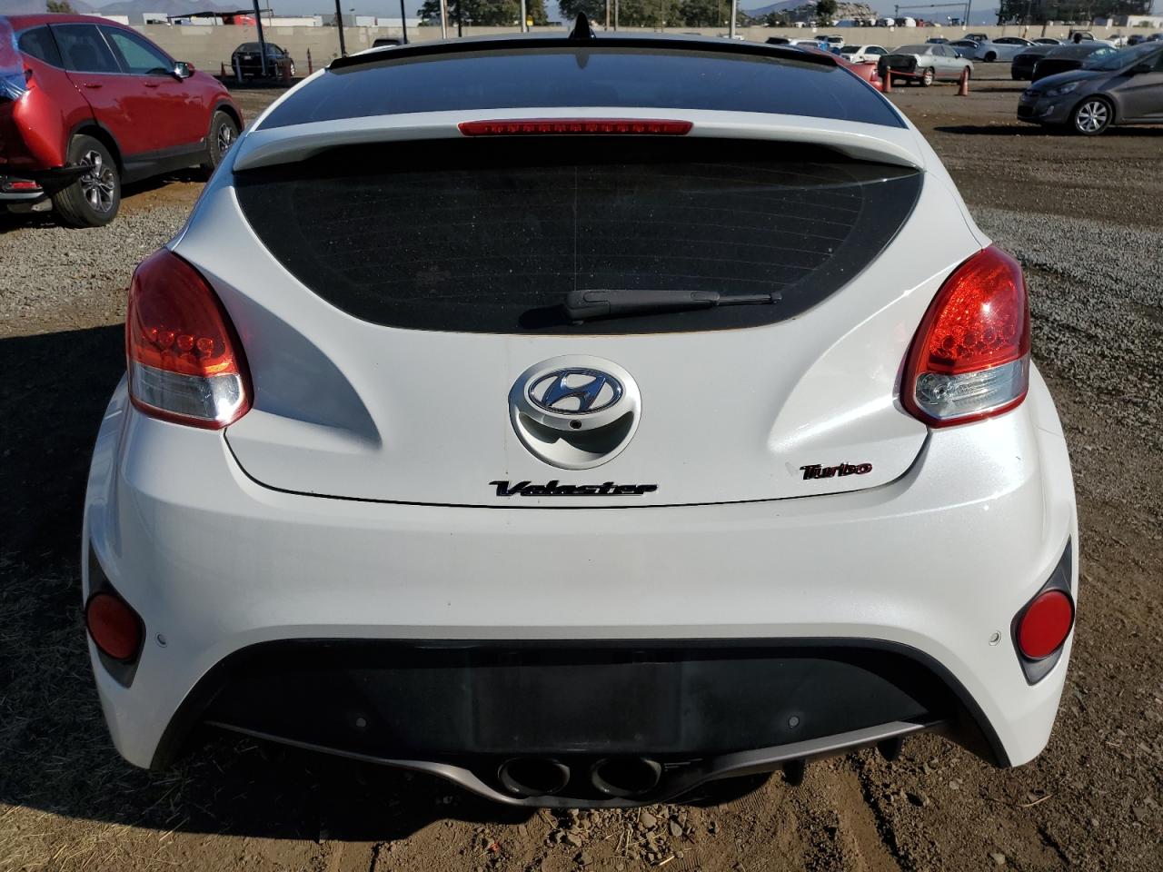 2014 Hyundai Veloster Turbo VIN: KMHTC6AEXEU209310 Lot: 75760264