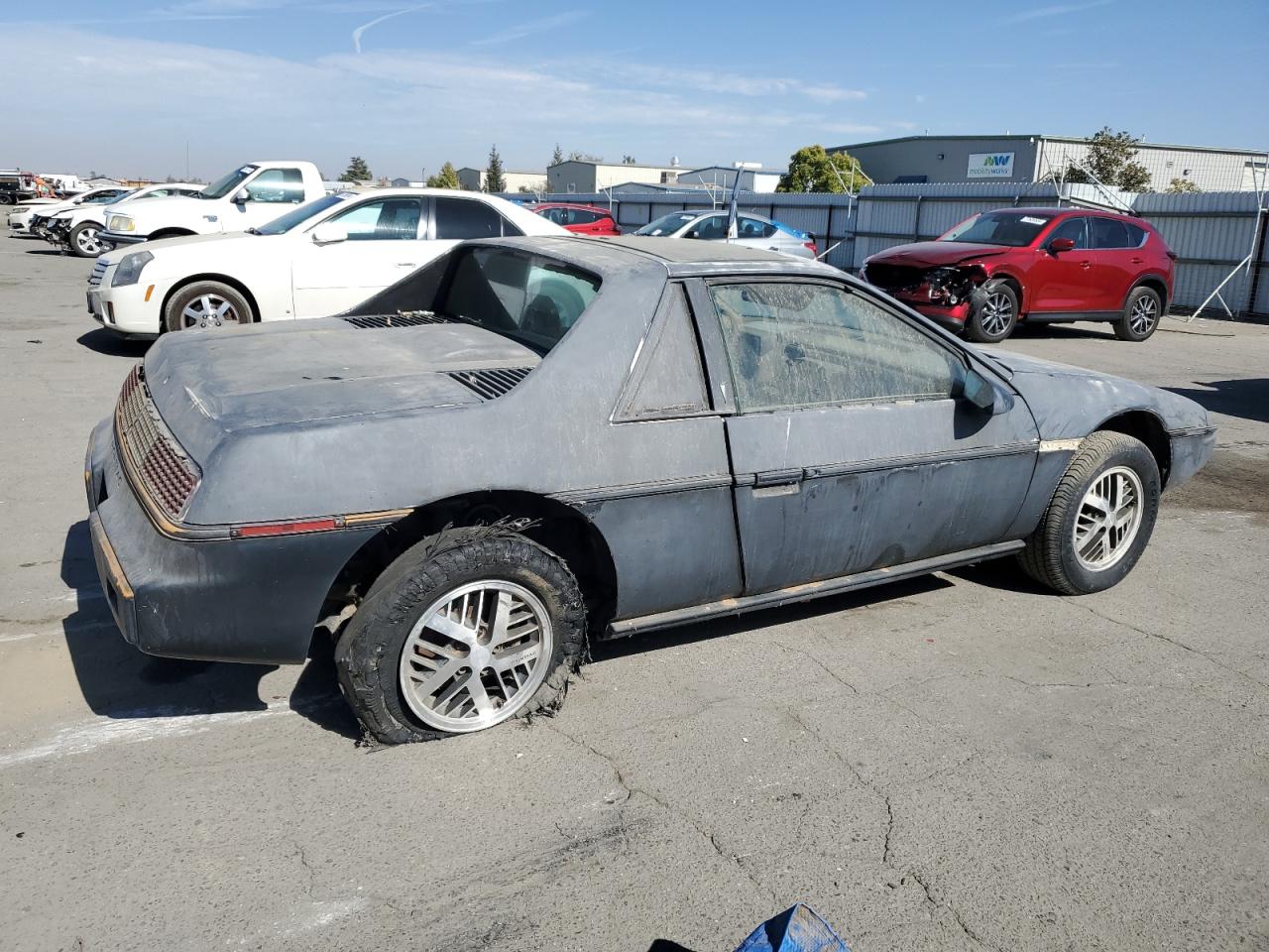 1986 Pontiac Fiero Sport VIN: 1G2PM37R2FP239143 Lot: 77043474