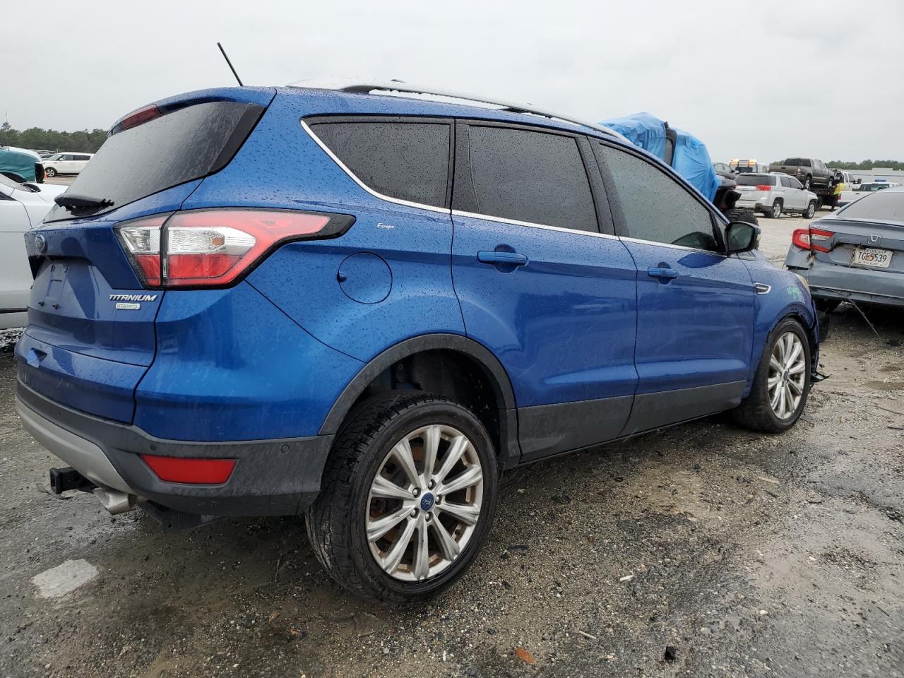 2018 Ford Escape Titanium VIN: 1FMCU0J90JUA69484 Lot: 74753124