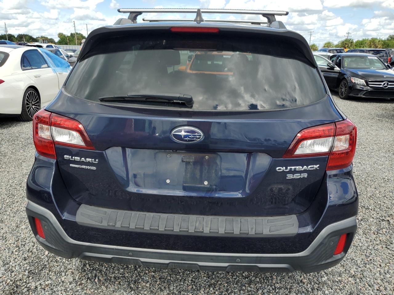 2018 Subaru Outback Touring VIN: 4S4BSETC7J3352834 Lot: 74389074