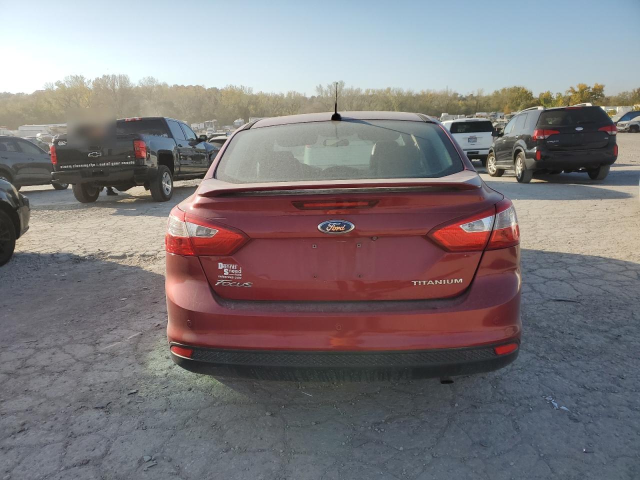 2014 Ford Focus Titanium VIN: 1FADP3J26EL210273 Lot: 77212084