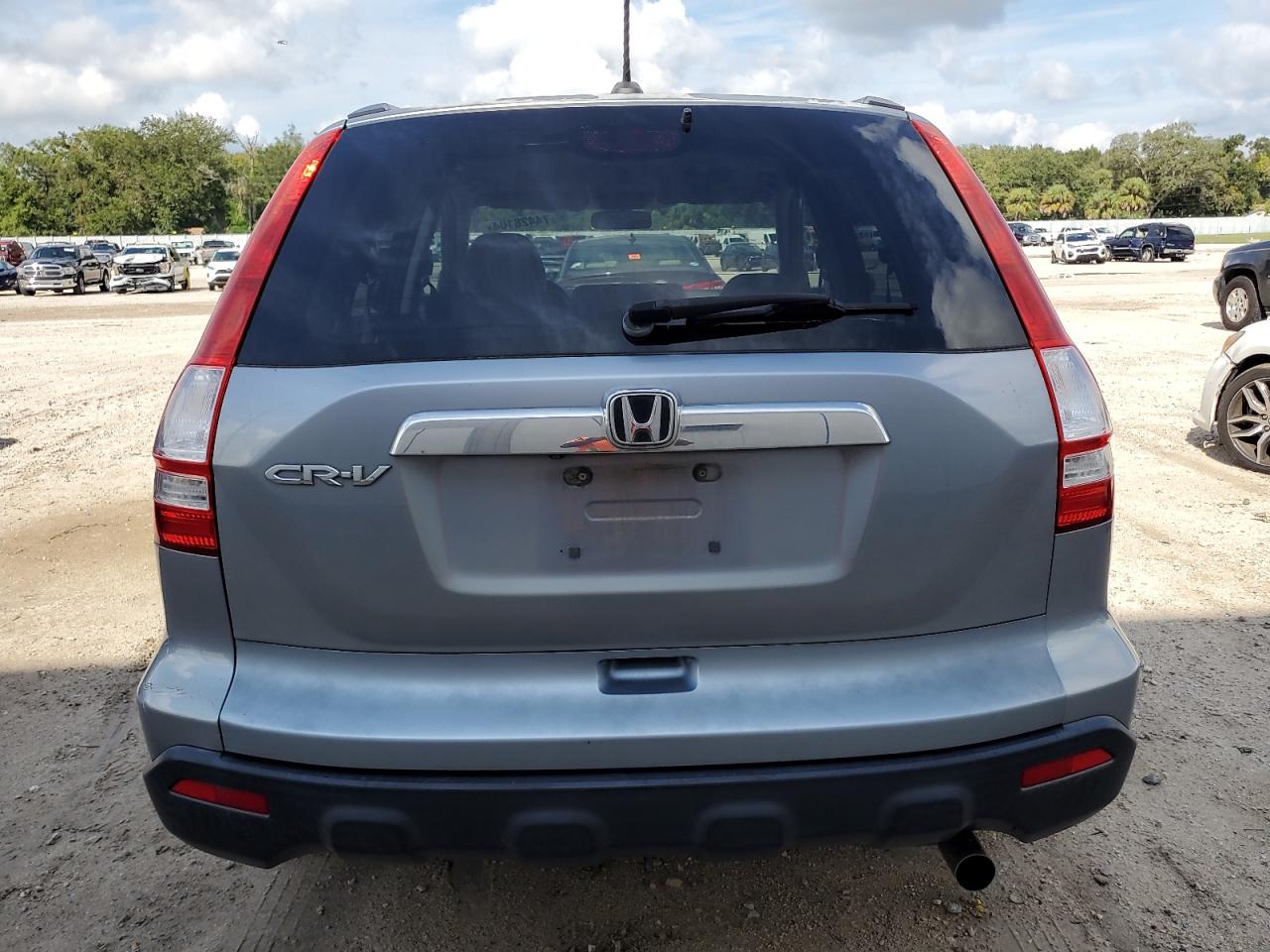 2007 Honda Cr-V Exl VIN: JHLRE387X7C069043 Lot: 74428104