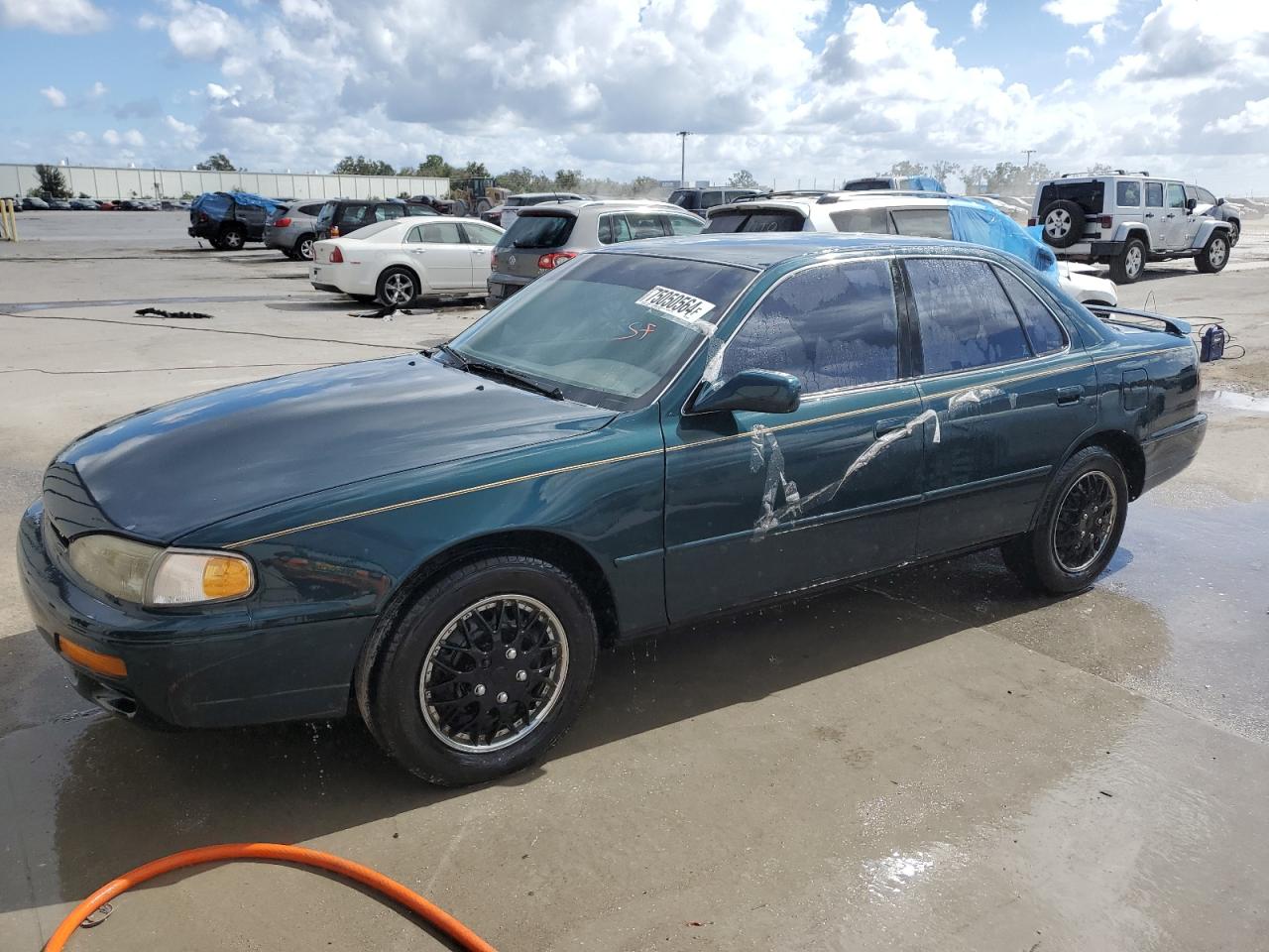 1996 Toyota Camry Le იყიდება Apopka-ში, FL - Side