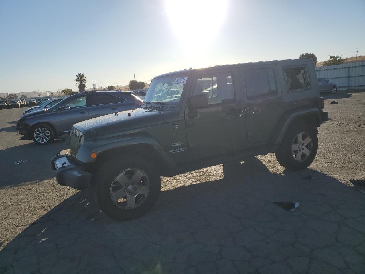 2009 Jeep Wrangler Unlimited Sahara VIN: 1J4GA59159L710764 Lot: 75525834