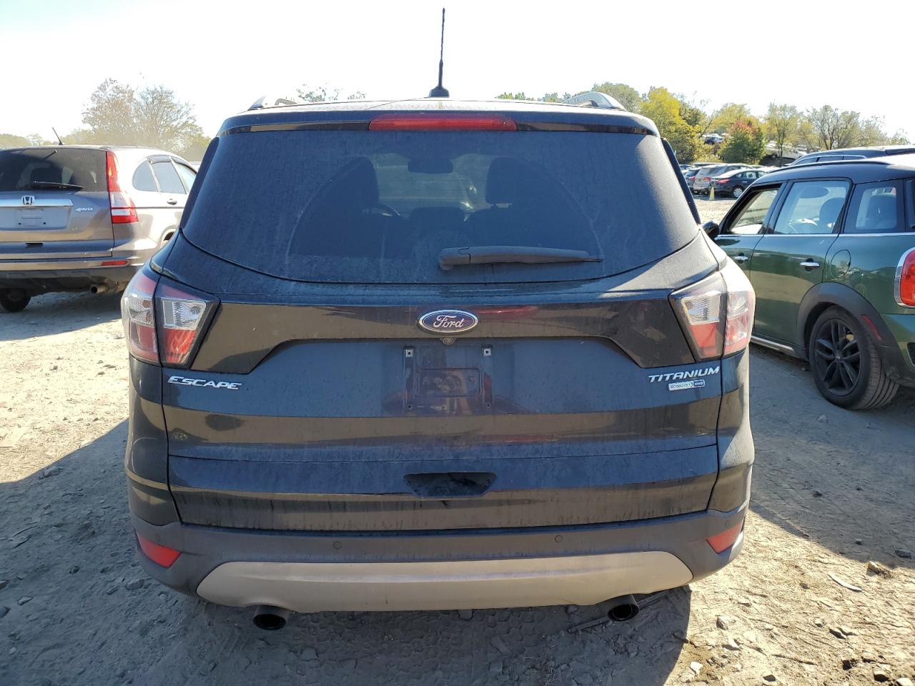 2017 Ford Escape Titanium VIN: 1FMCU9J90HUE82942 Lot: 77354374