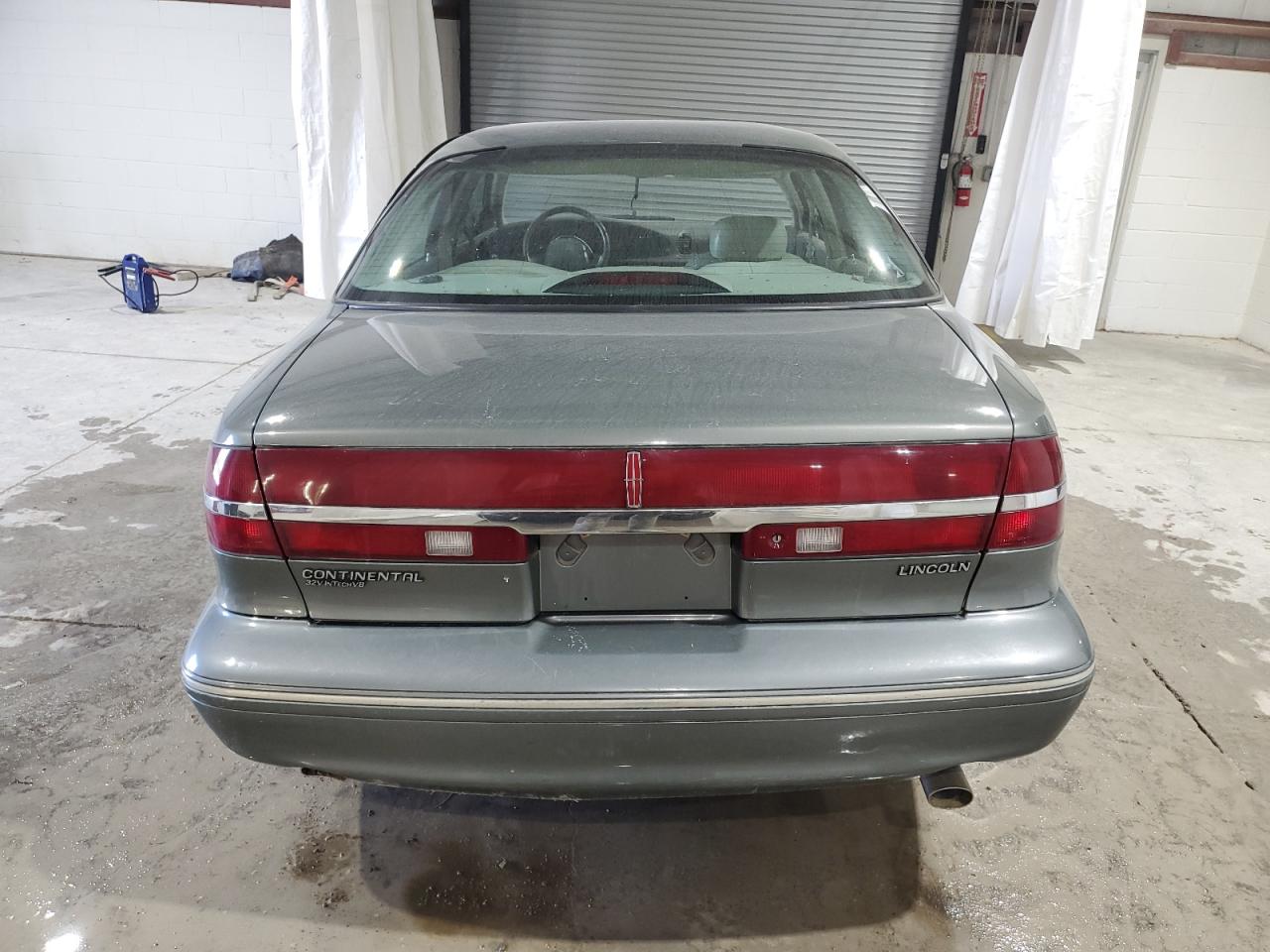 1997 Lincoln Continental VIN: 1LNLM97VXVY624609 Lot: 73921634