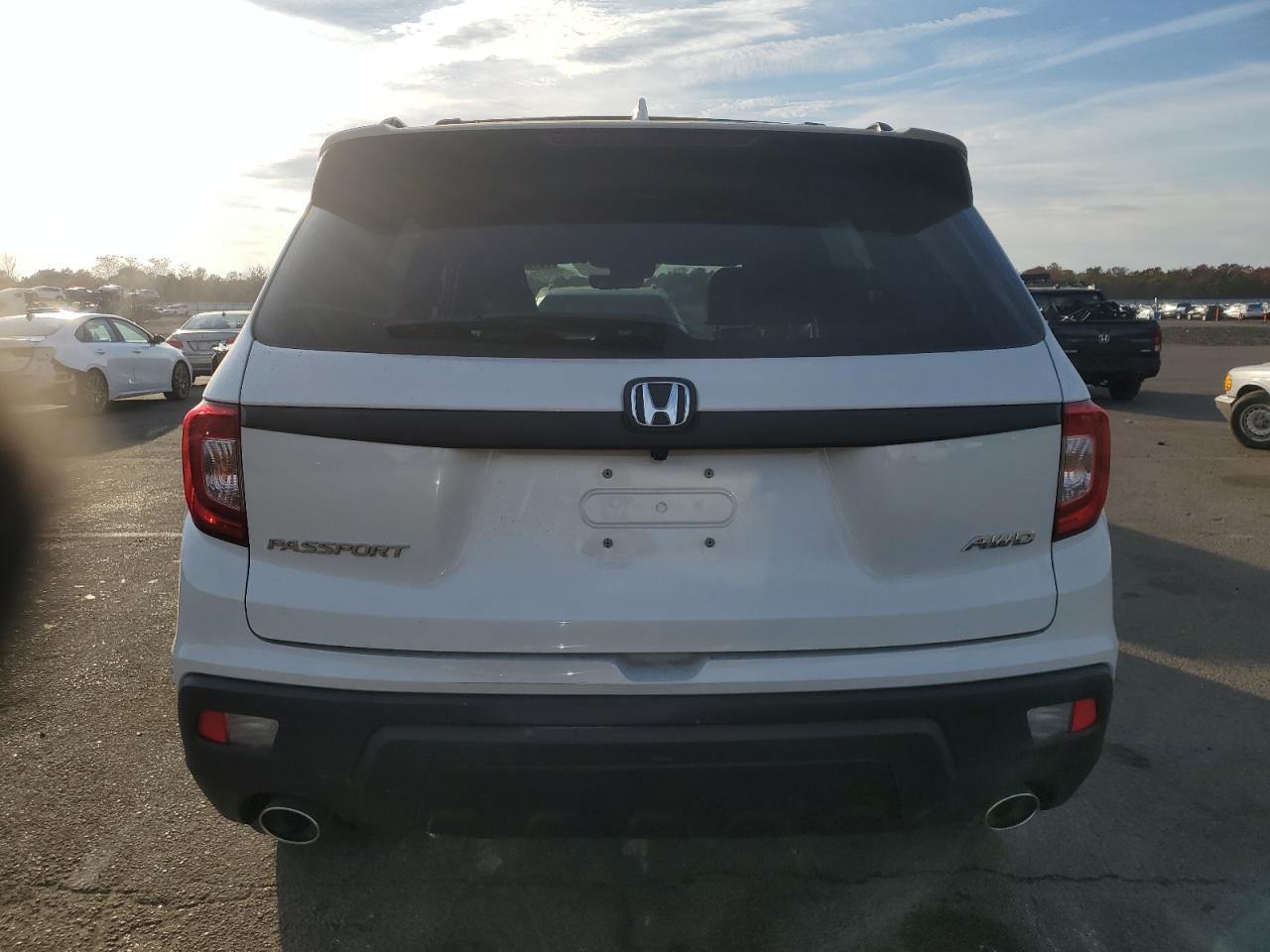 2021 Honda Passport Exl VIN: 5FNYF8H53MB042394 Lot: 75709214