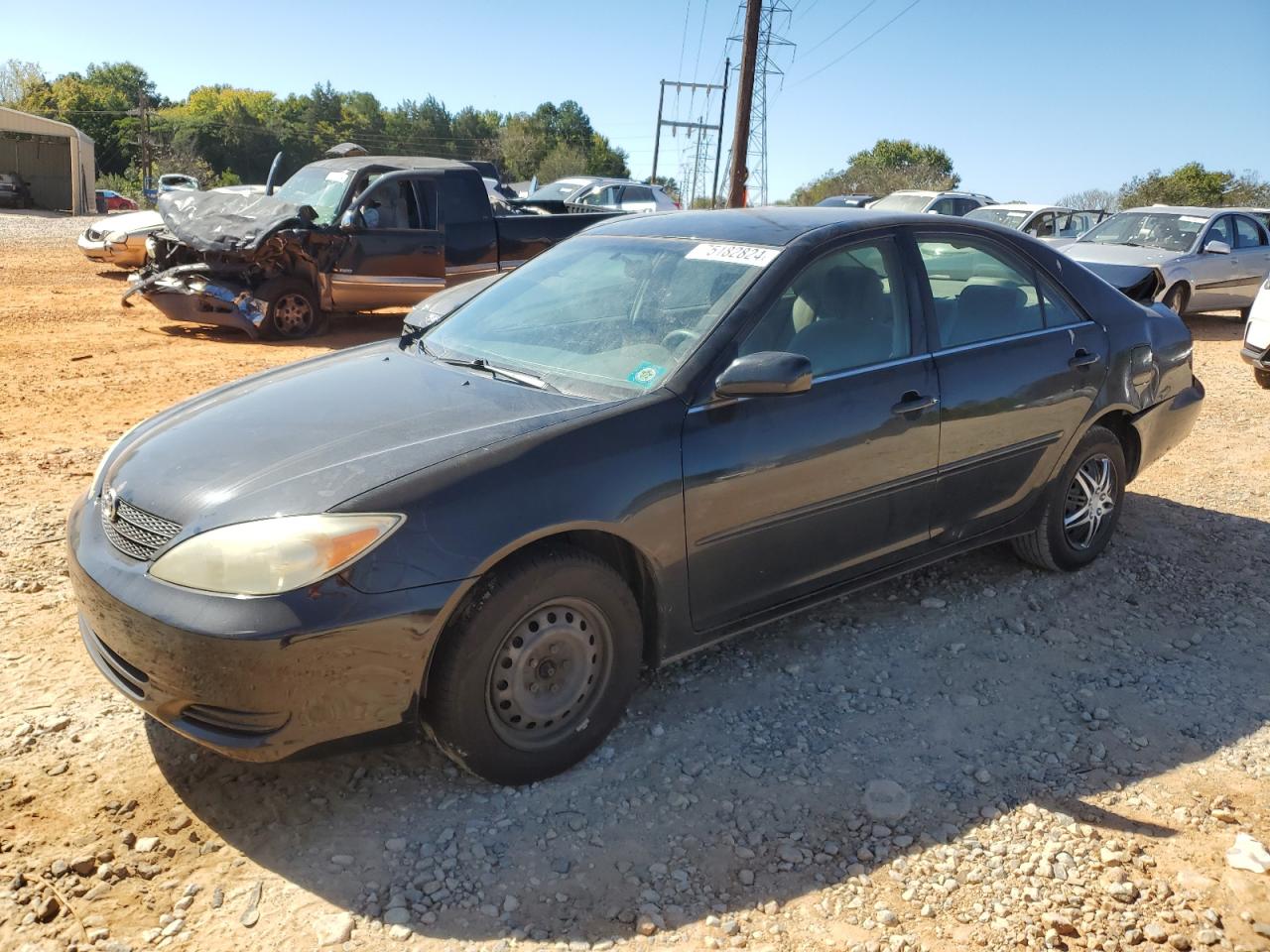 2003 Toyota Camry Le VIN: JTDBE32KX30191893 Lot: 75182824