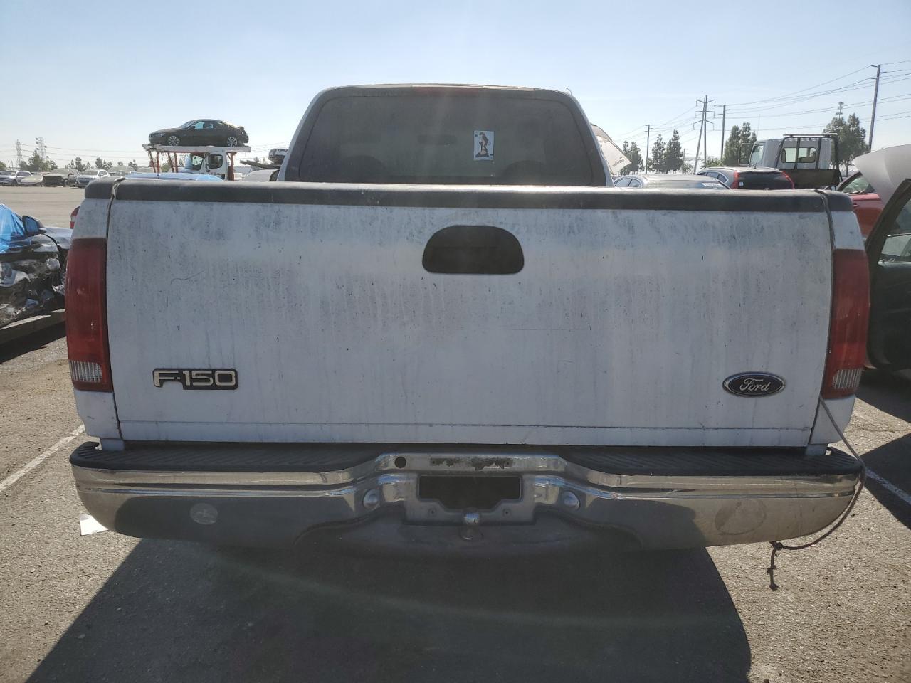 1999 Ford F150 VIN: 1FTZF1722XKA39223 Lot: 77898444