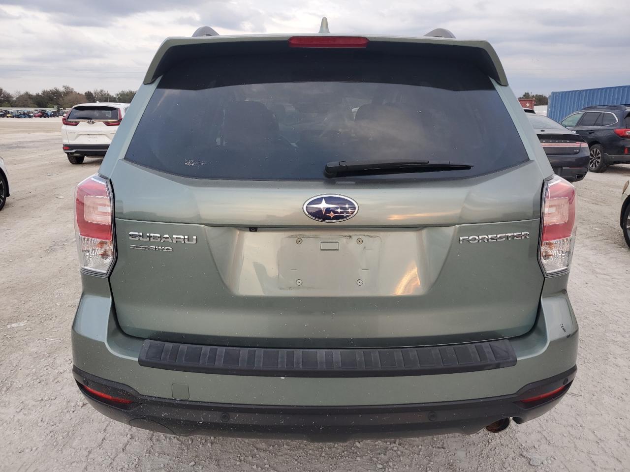 2018 Subaru Forester 2.5I Limited VIN: JF2SJARC9JH525782 Lot: 77811774